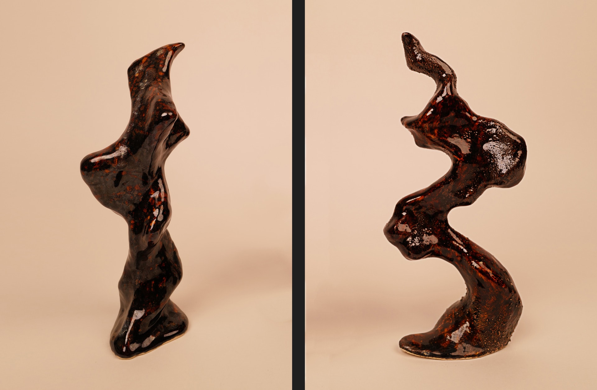 Two red glaze sculptures in Orange light background