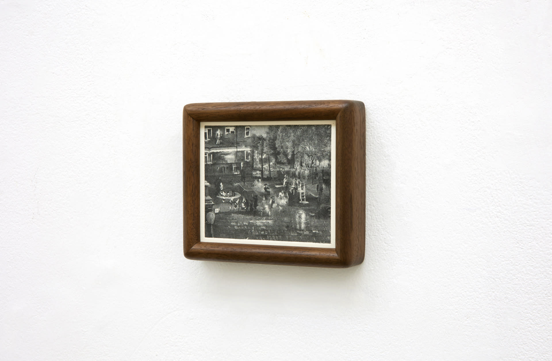 A framed print on a white wall background.