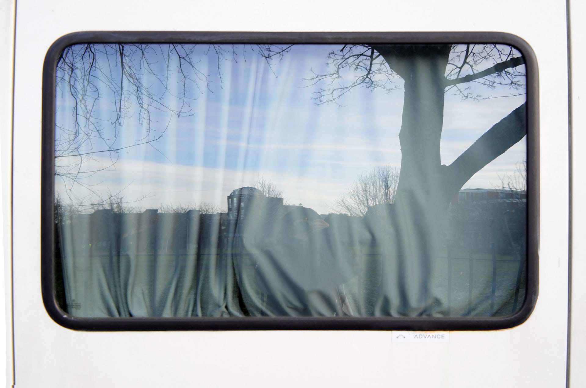 A blue reflective glass window