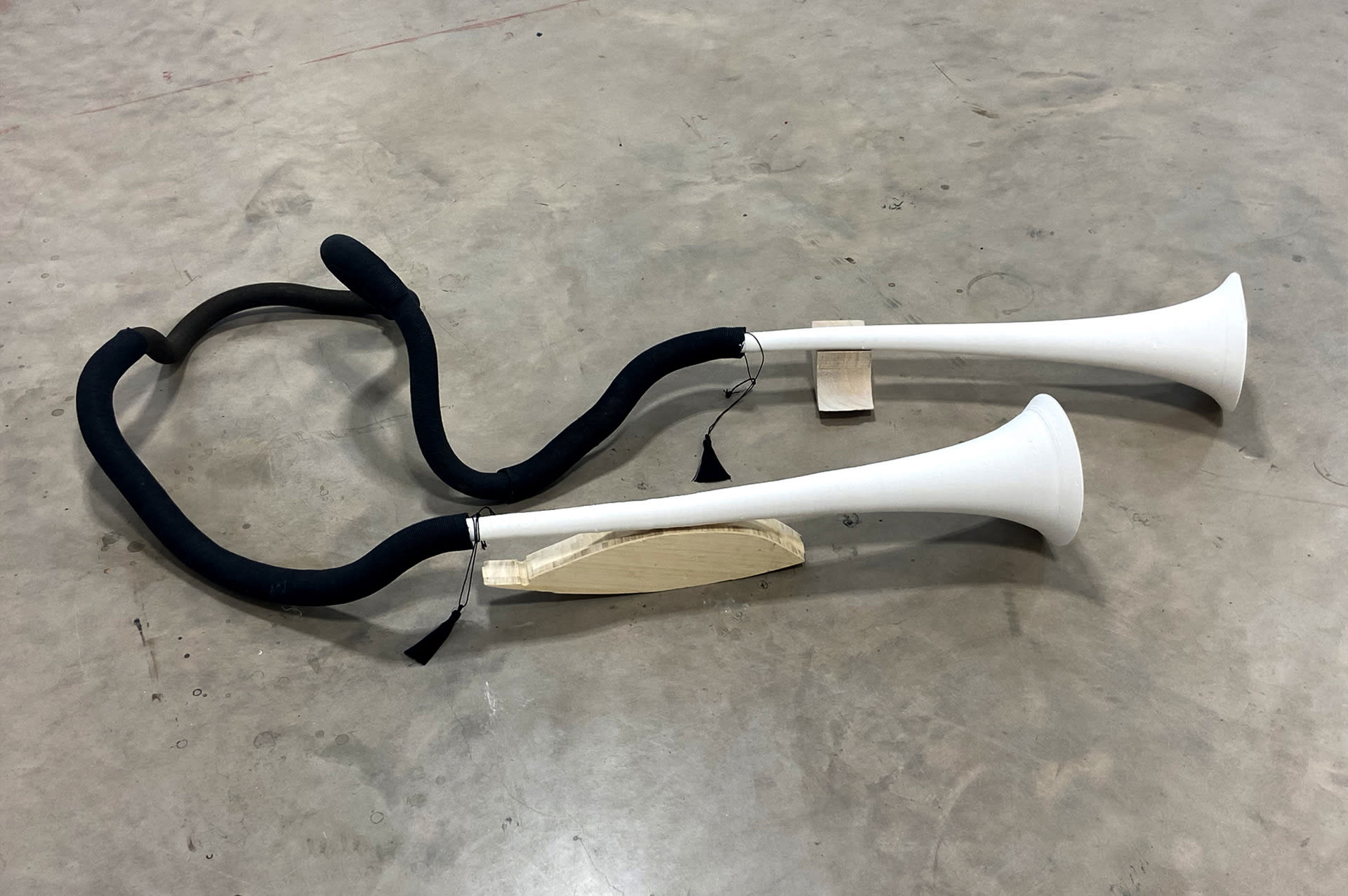 3d printed ceramic horns and cardboard pipe