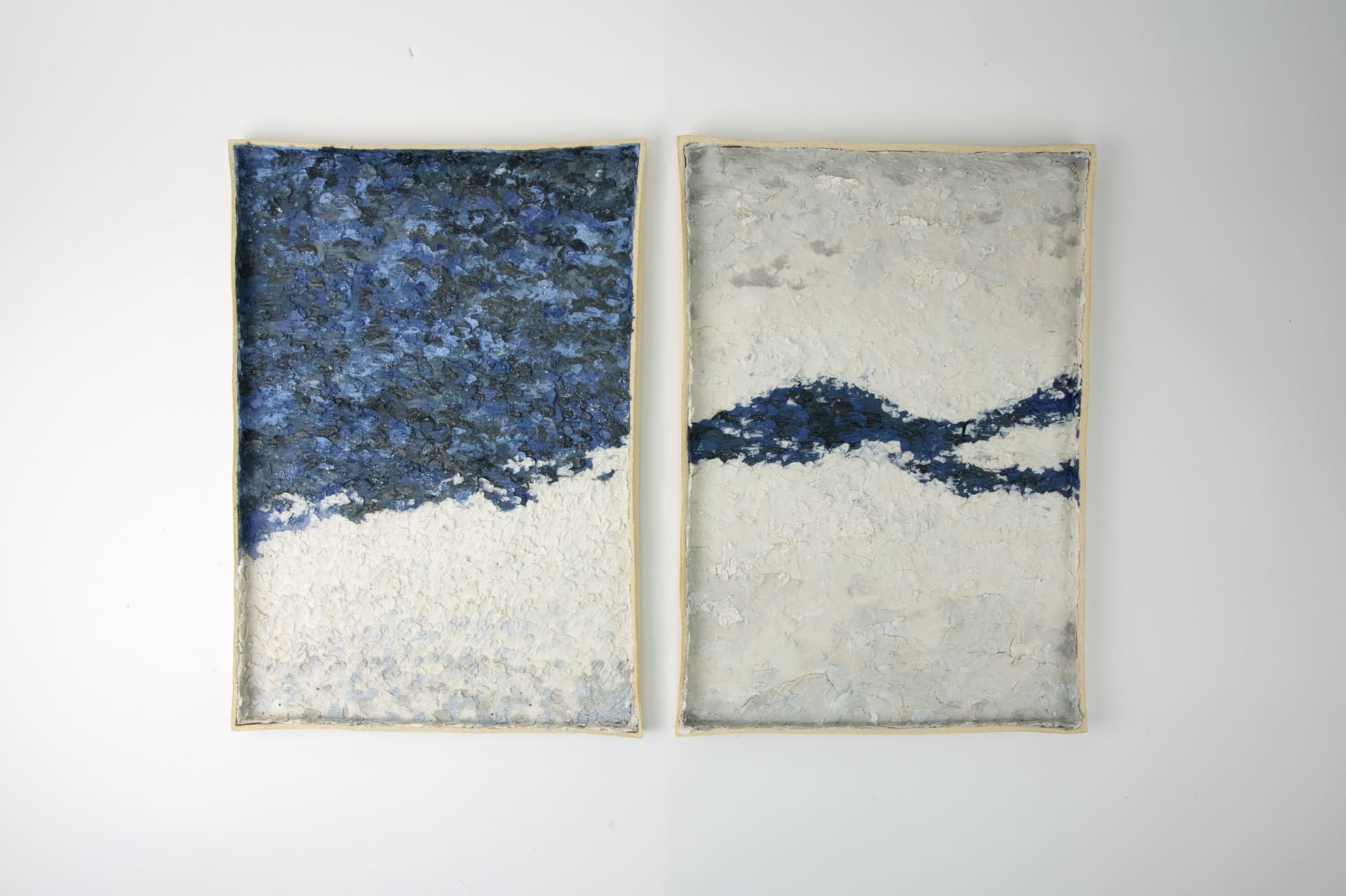 Two square ceramic pieces that inspired by sky and cloud.