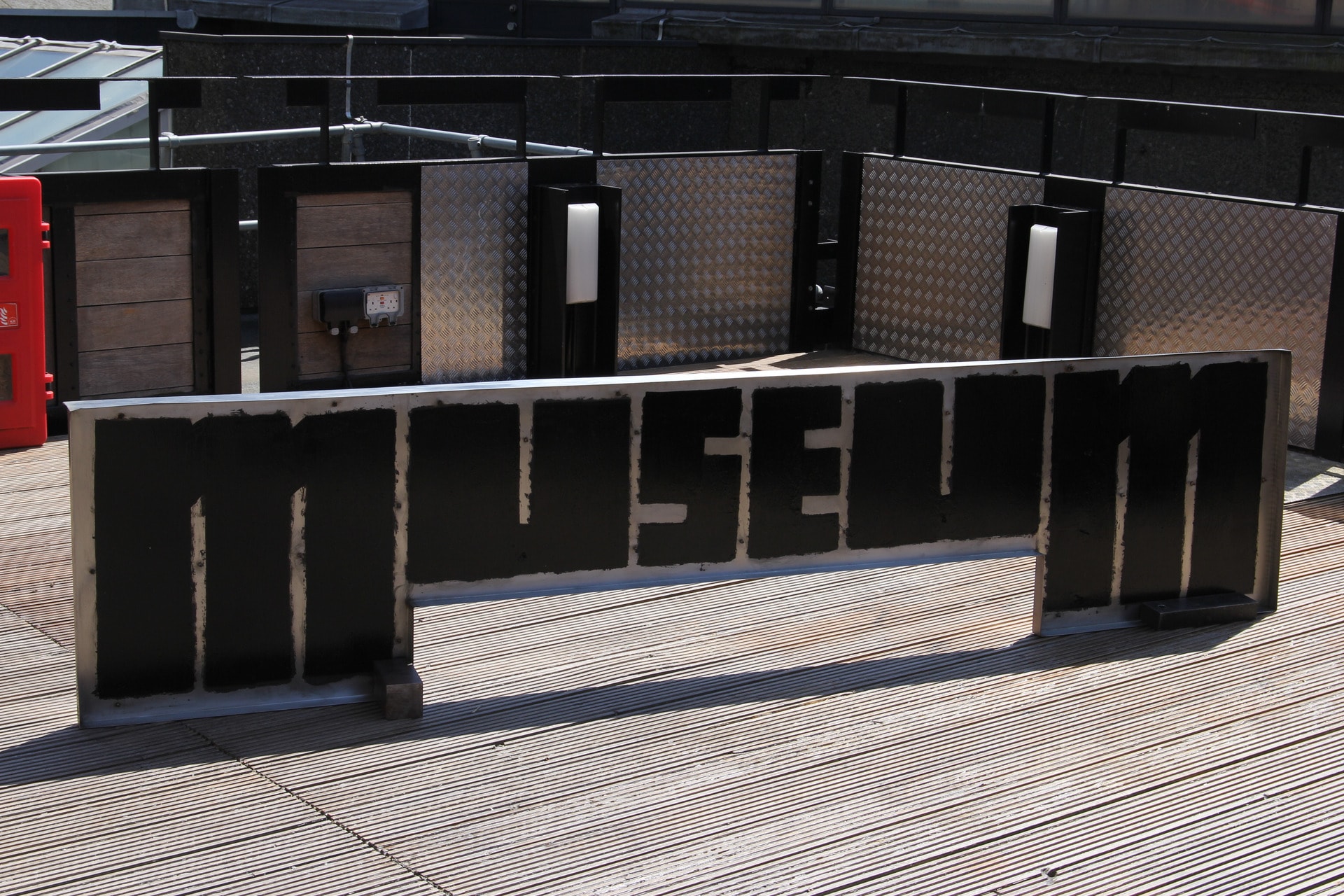 The countertop of the former student's bar turned on its side to look like a model of a facade of a museum.