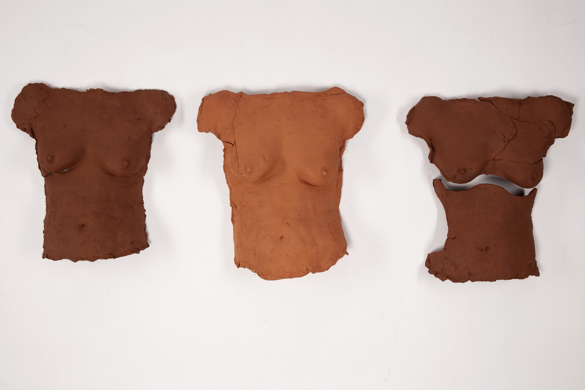 Antigone’s reclaimed body, 2022, fired terracotta clay, 44cm x 36 cm x 5 cm