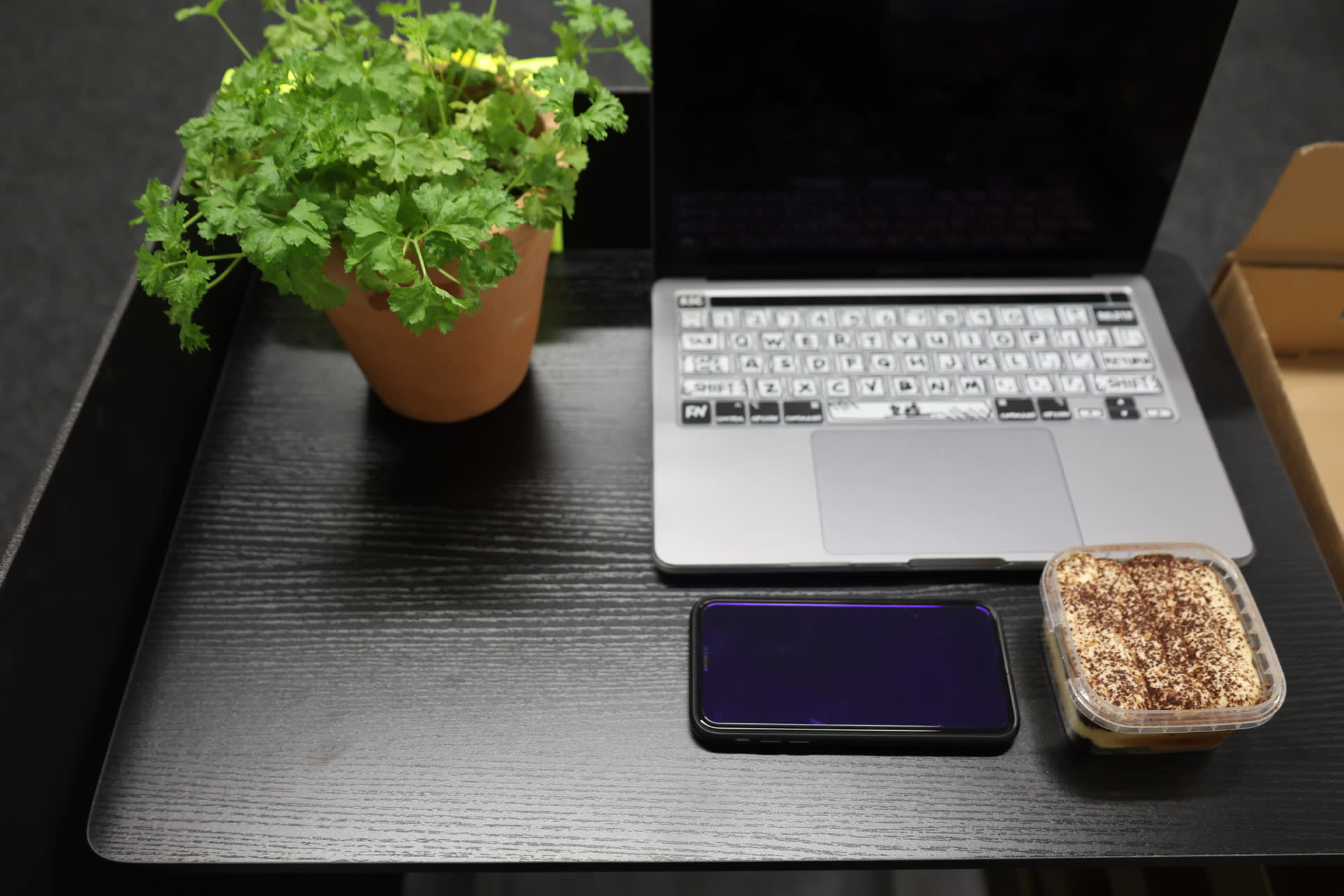 Prototype - Birthday Party for Concierge solely — The concierge alone take out the cake his family had prepared during the day and began to taste it while watching CCTV.