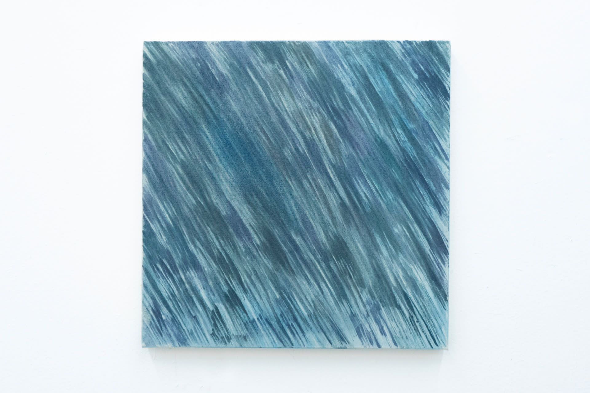 a blue/green square painting with soft and sharp, dark diagonal lines on top