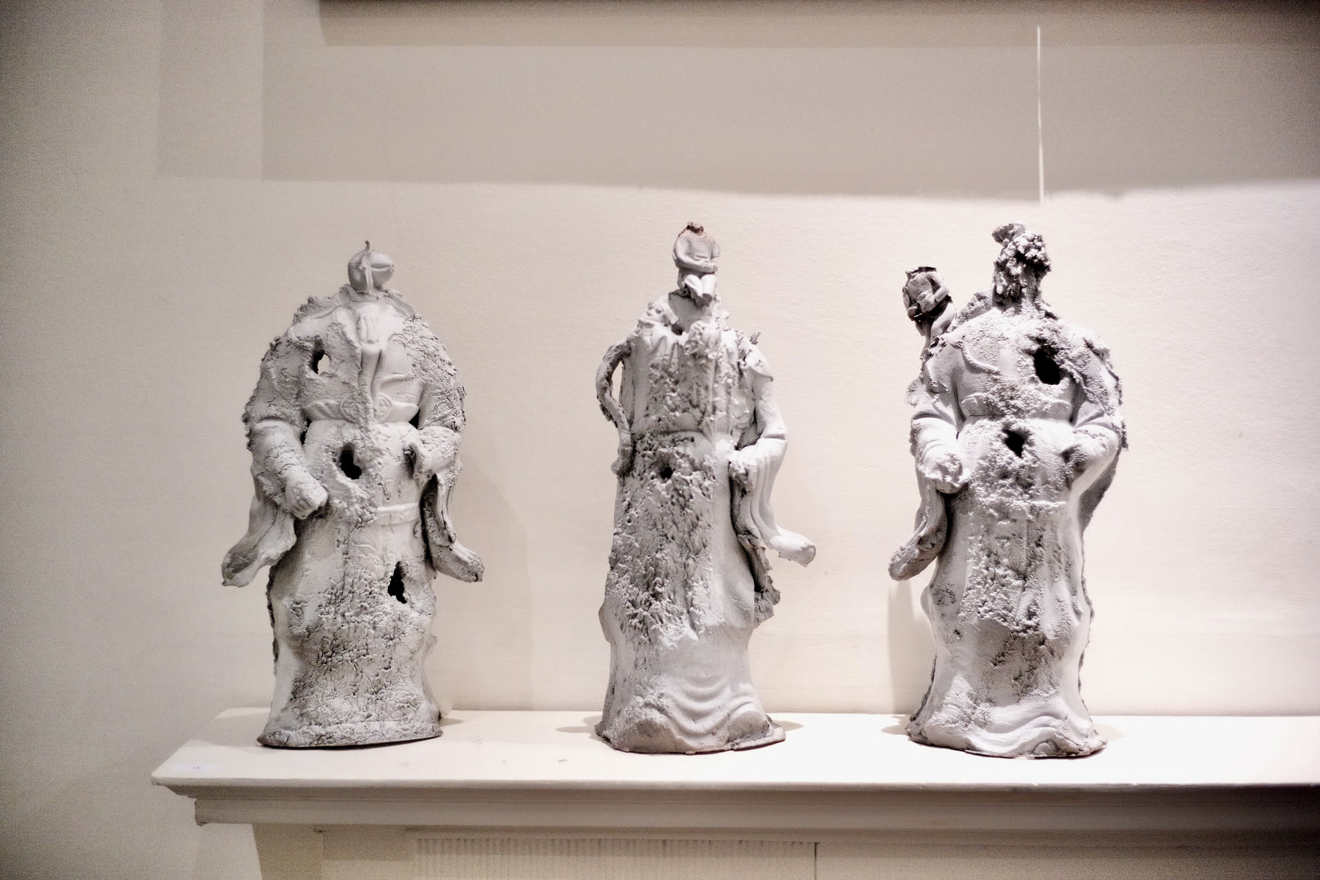 abstract ceramic sculptures created by collage and water erosion