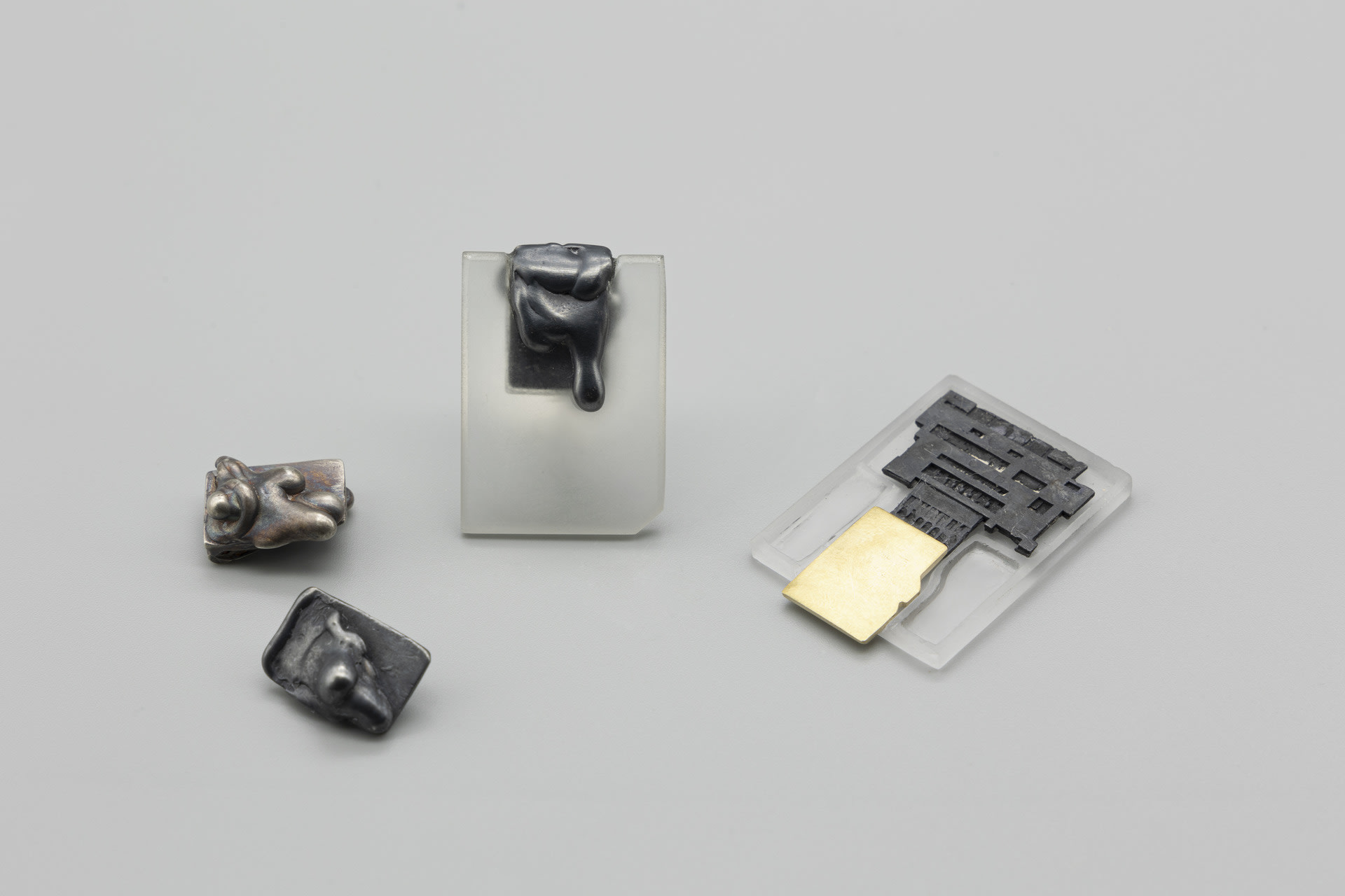 sd card and micro chip made from rock crystal, silver and gold