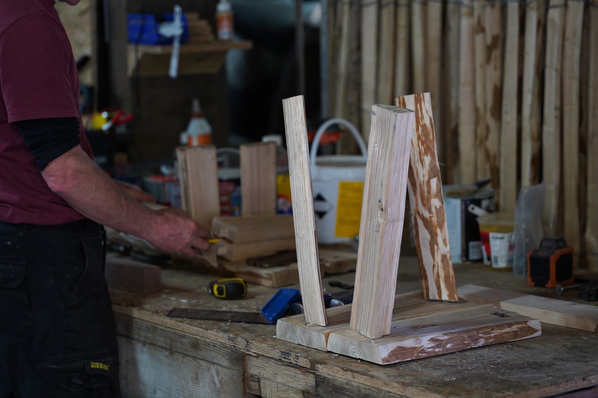 co-working with a crafter to make a stool