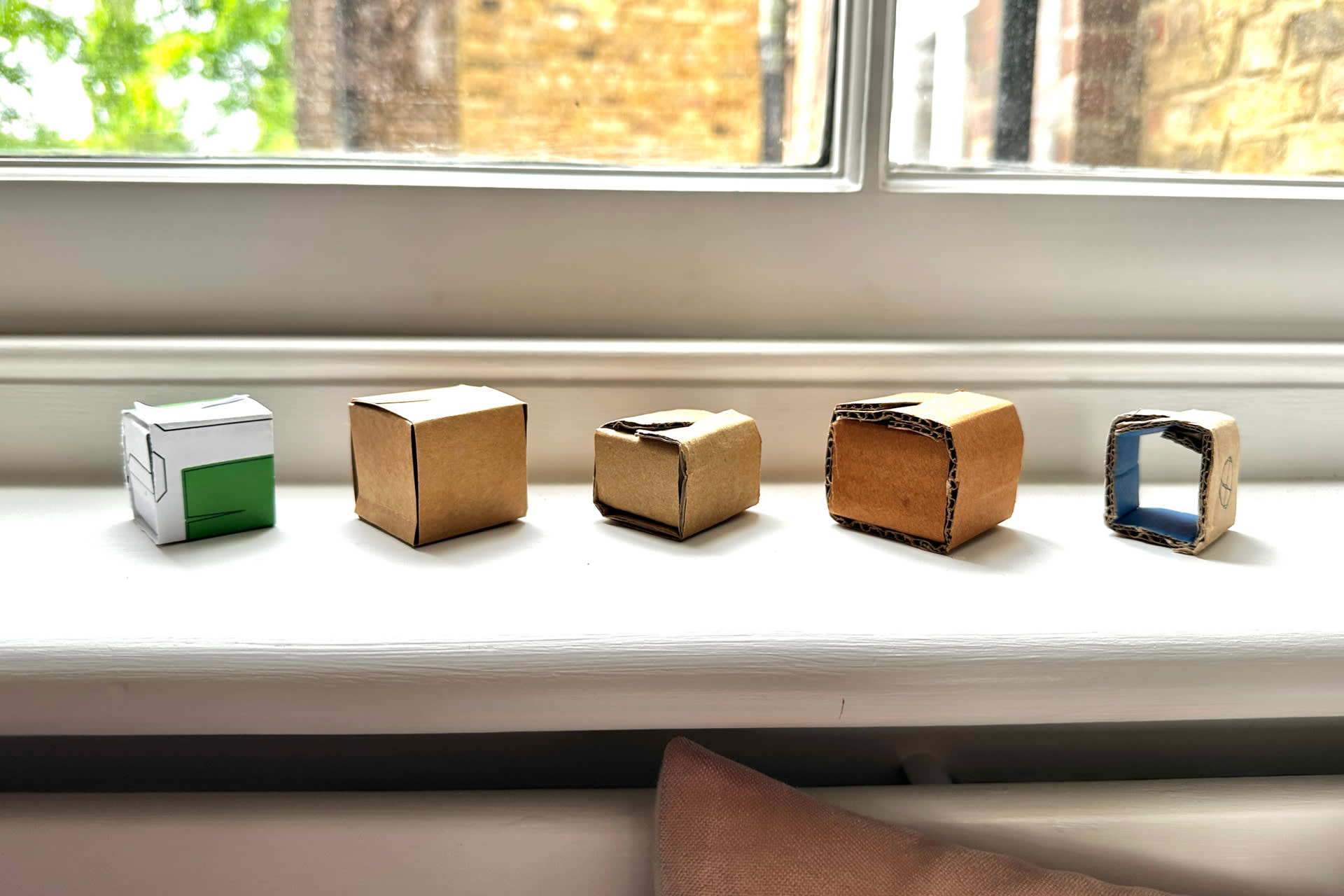 5 paper/card cubes that showcases a method applicable to most paper-based materials