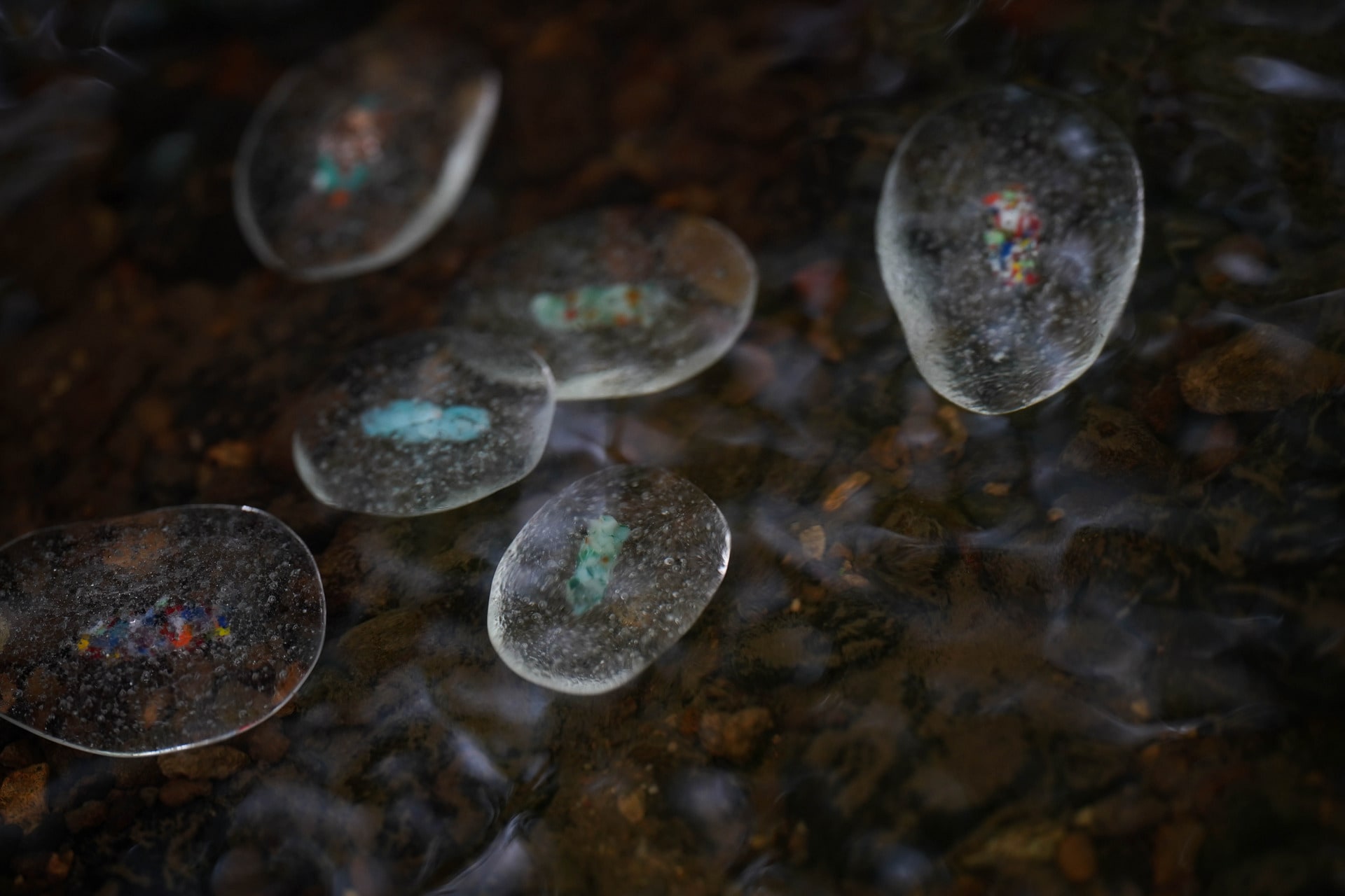 Glass Pebbles in the river.