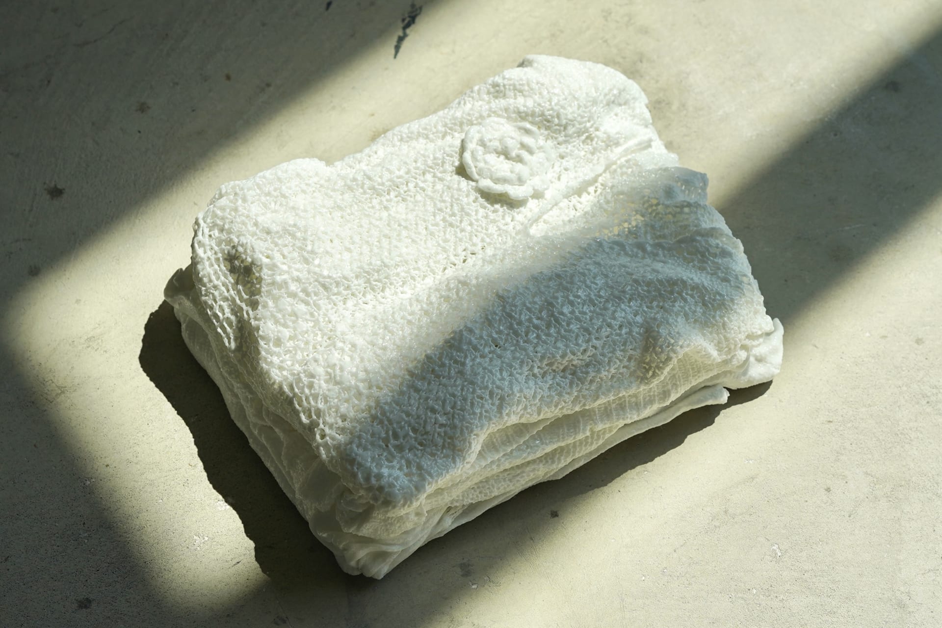 A white porcelain sweater