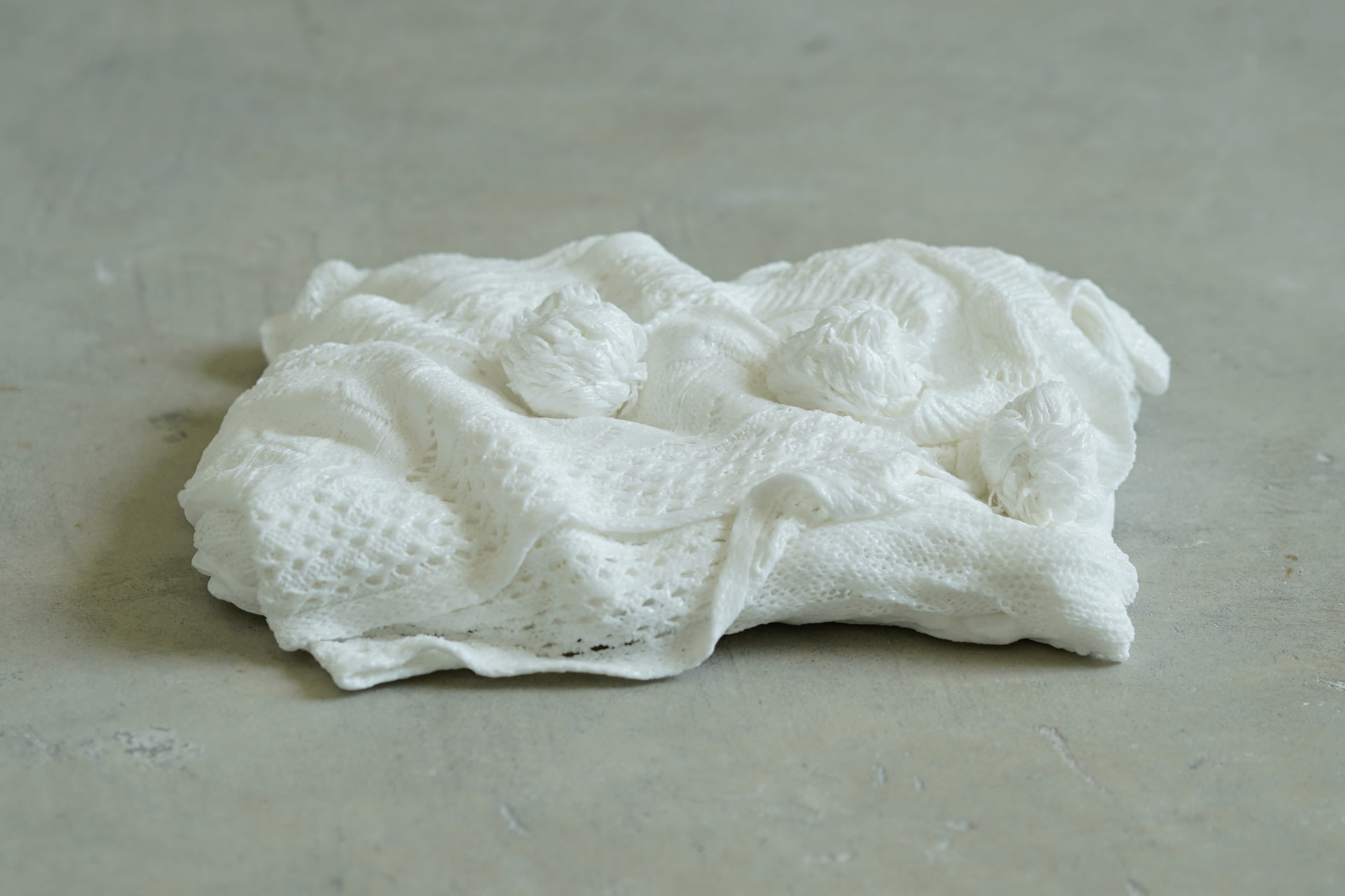 A white porcelain sweater