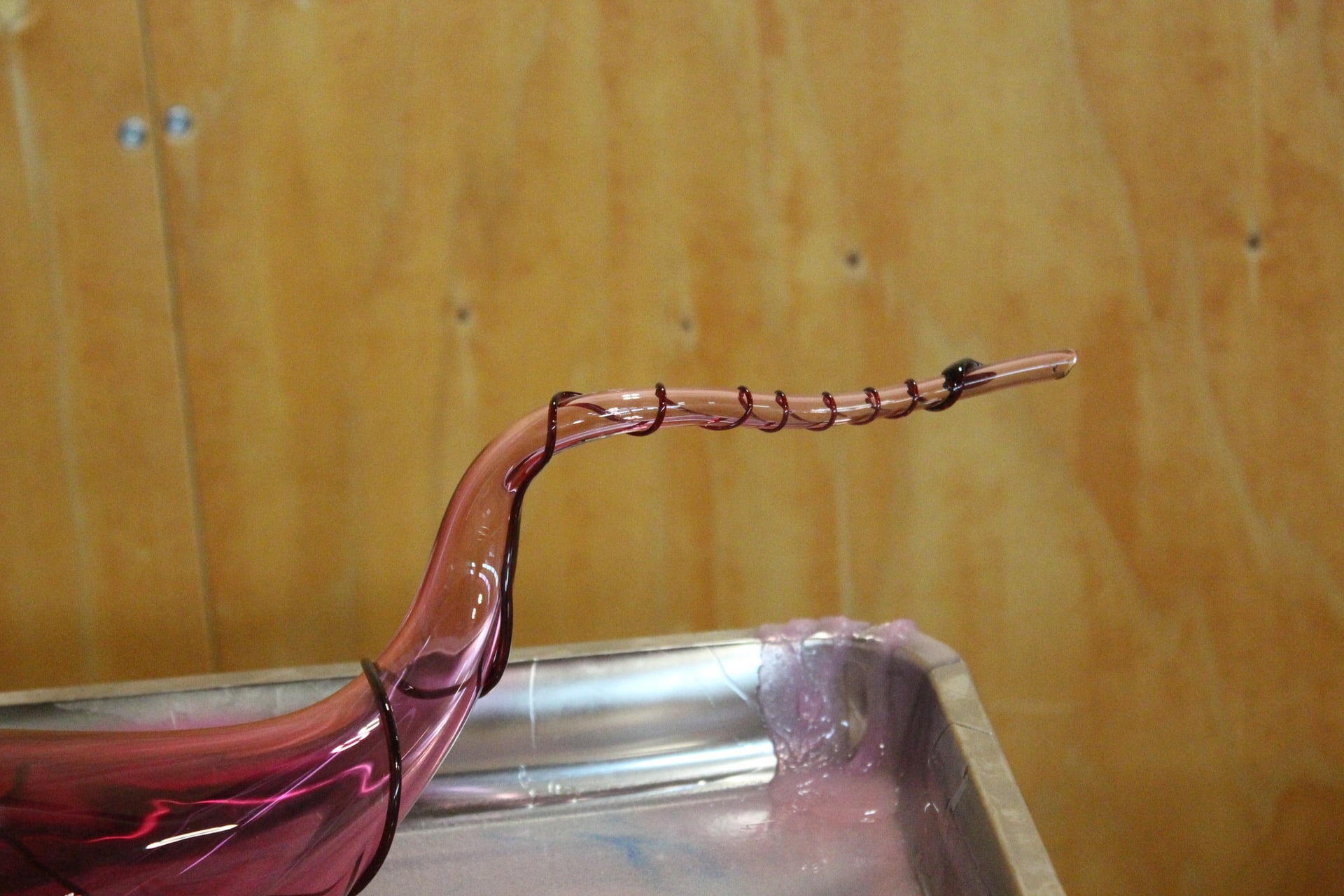 close up of spine of a glass pink blown piece