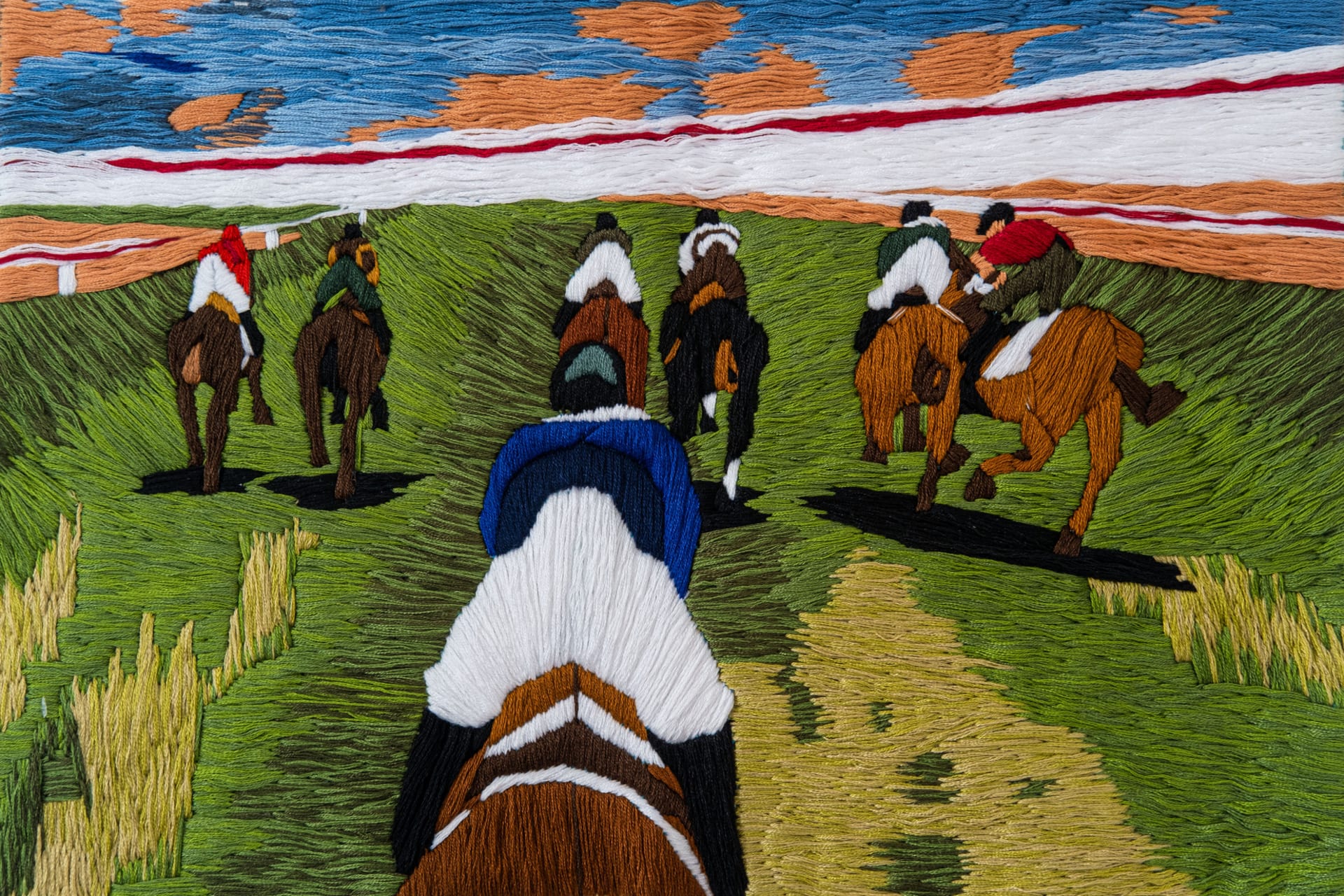 Pictures taken at horse races, 7 horses in competition, turned into embroidery