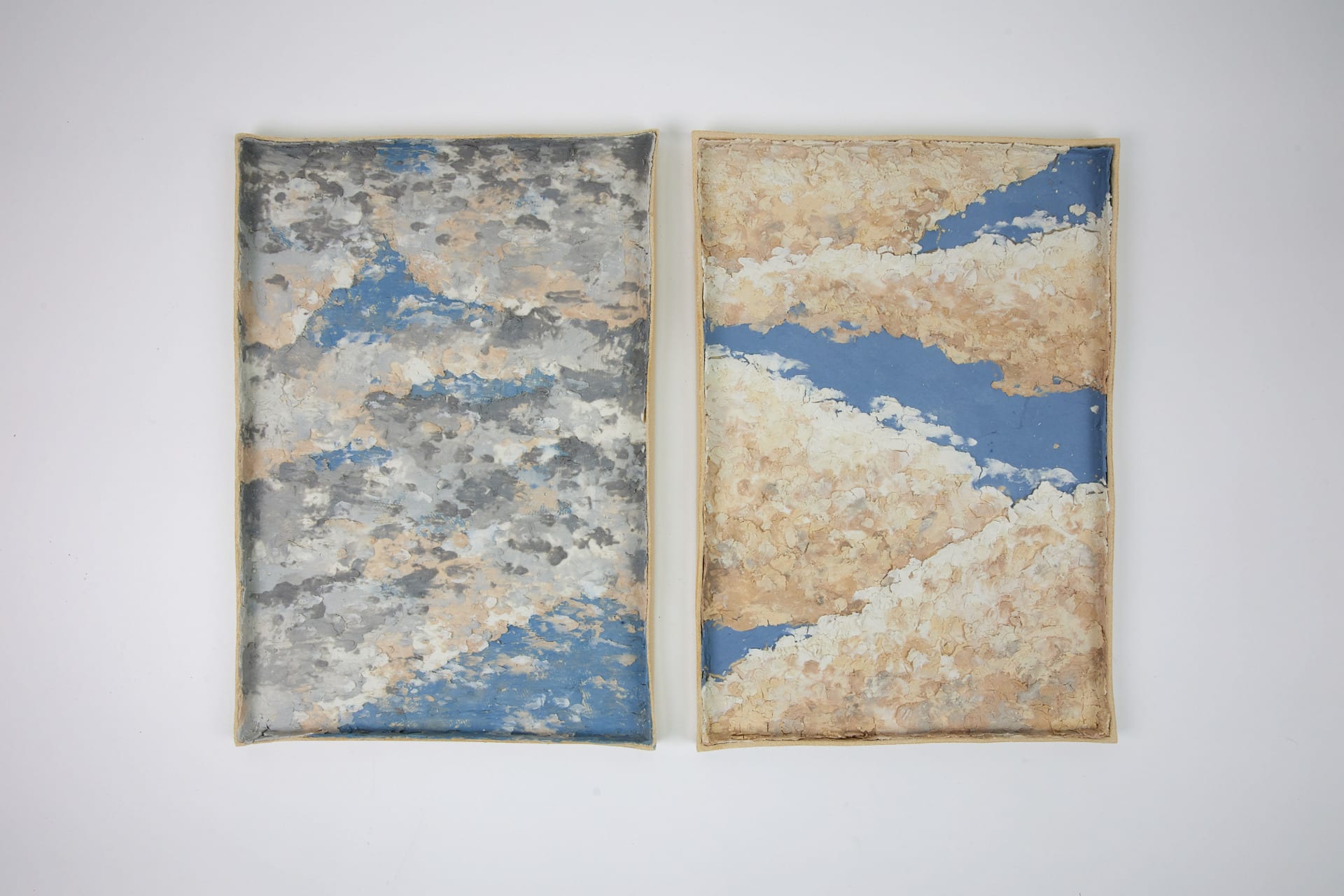 Two square ceramic pieces that inspired by sky and cloud.