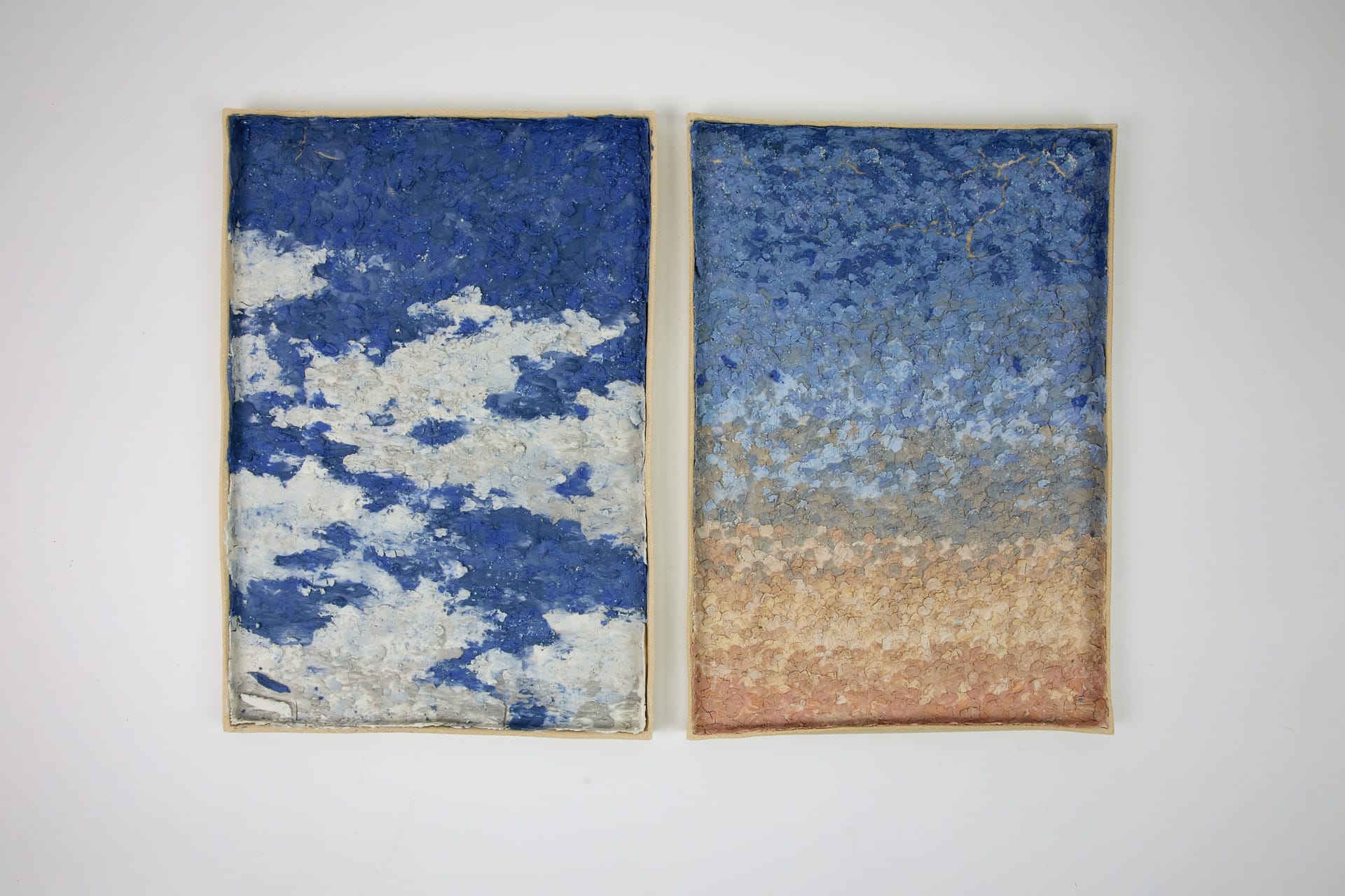 Two square ceramic pieces that inspired by sky and cloud.