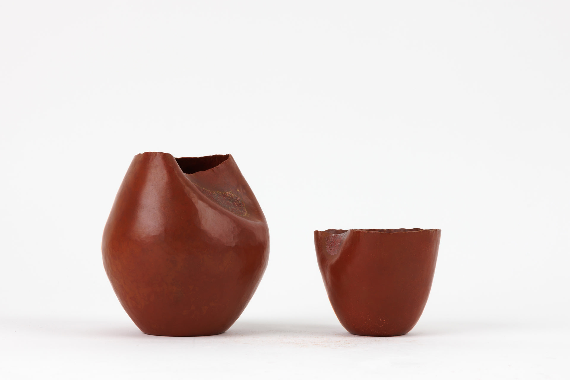 Two copper vessels