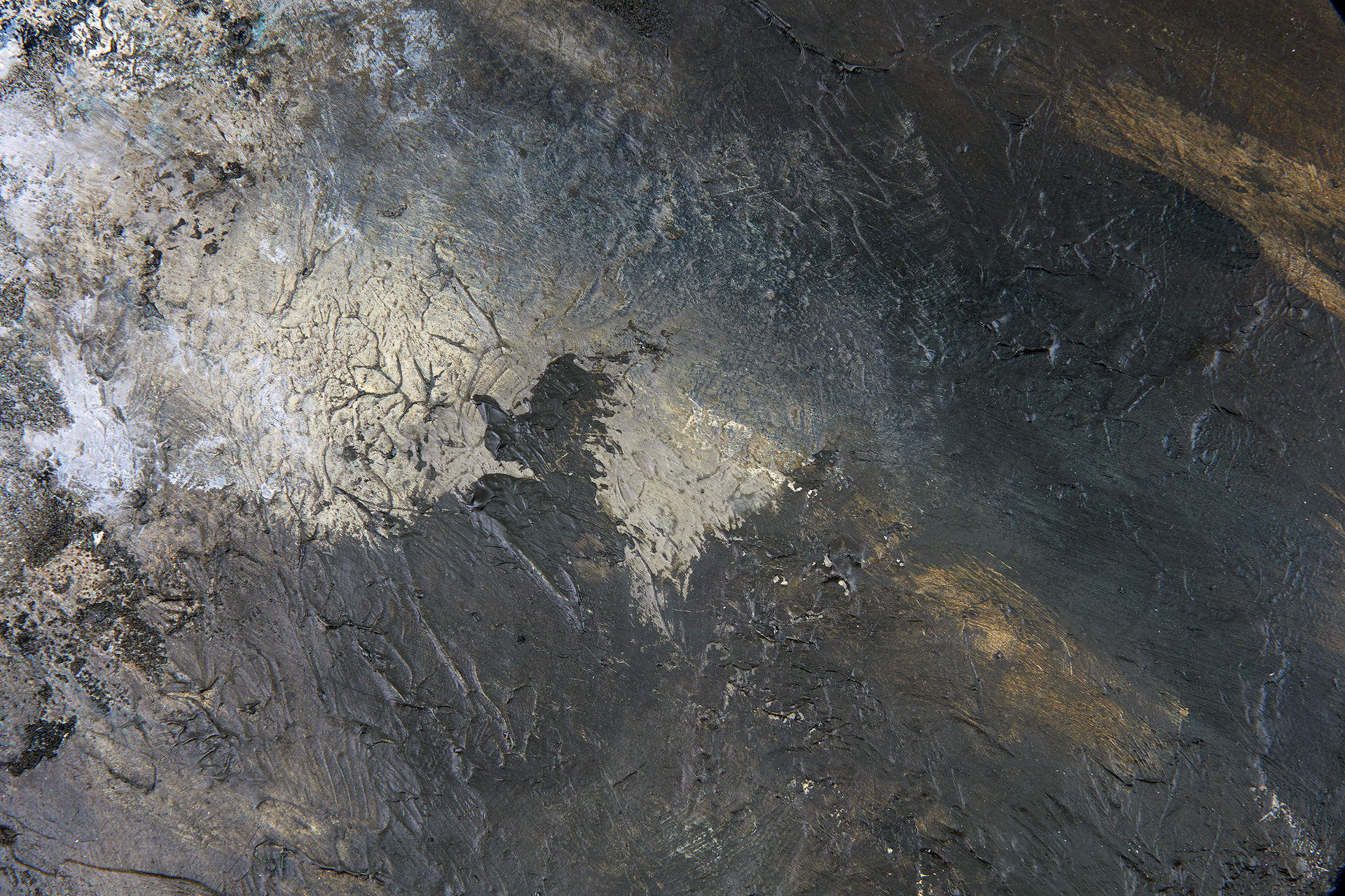 A close-up of one of the smaller canvases. Brown in palette with a cracked surface texture.