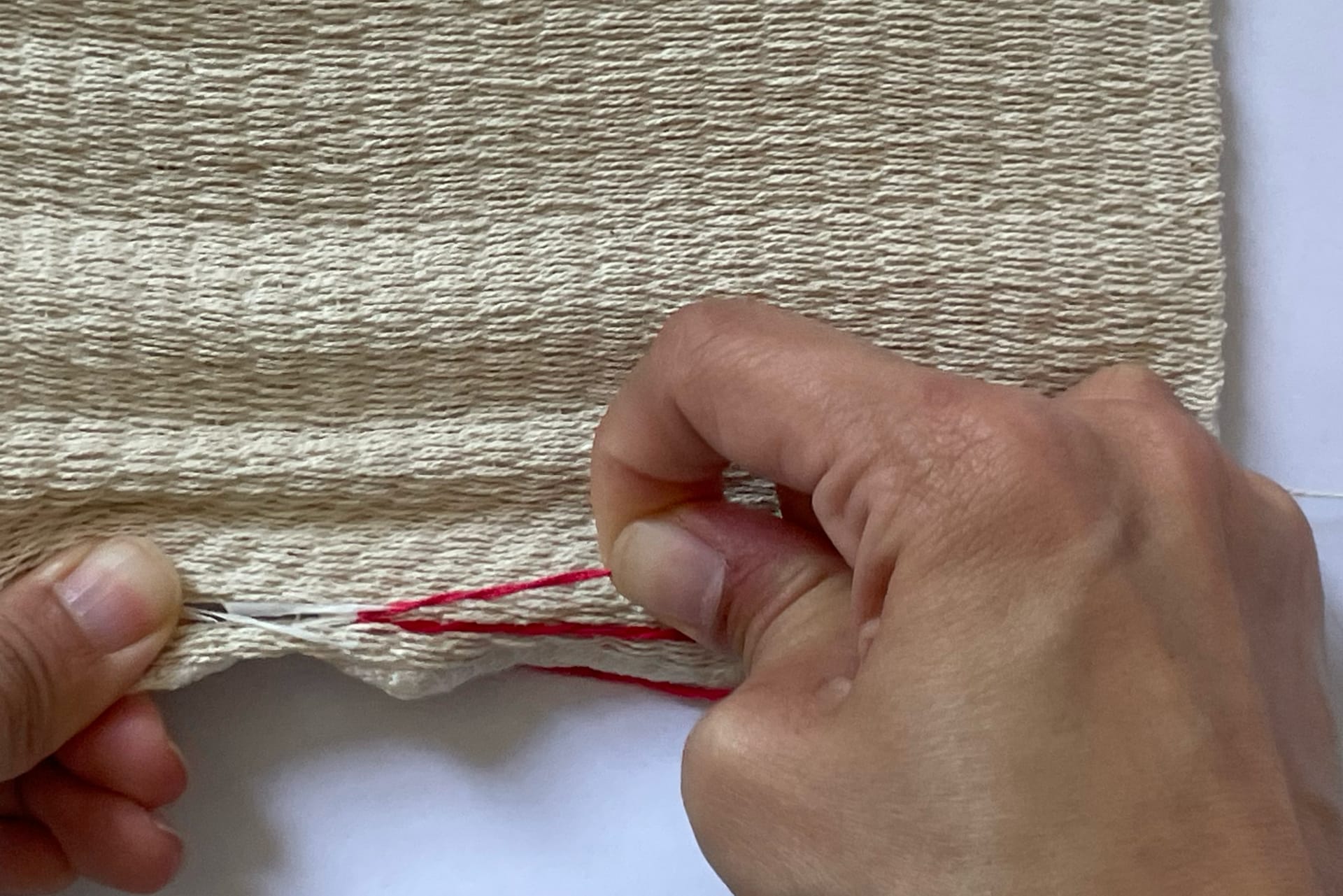 Use of paper yarns to create perforations in textiles