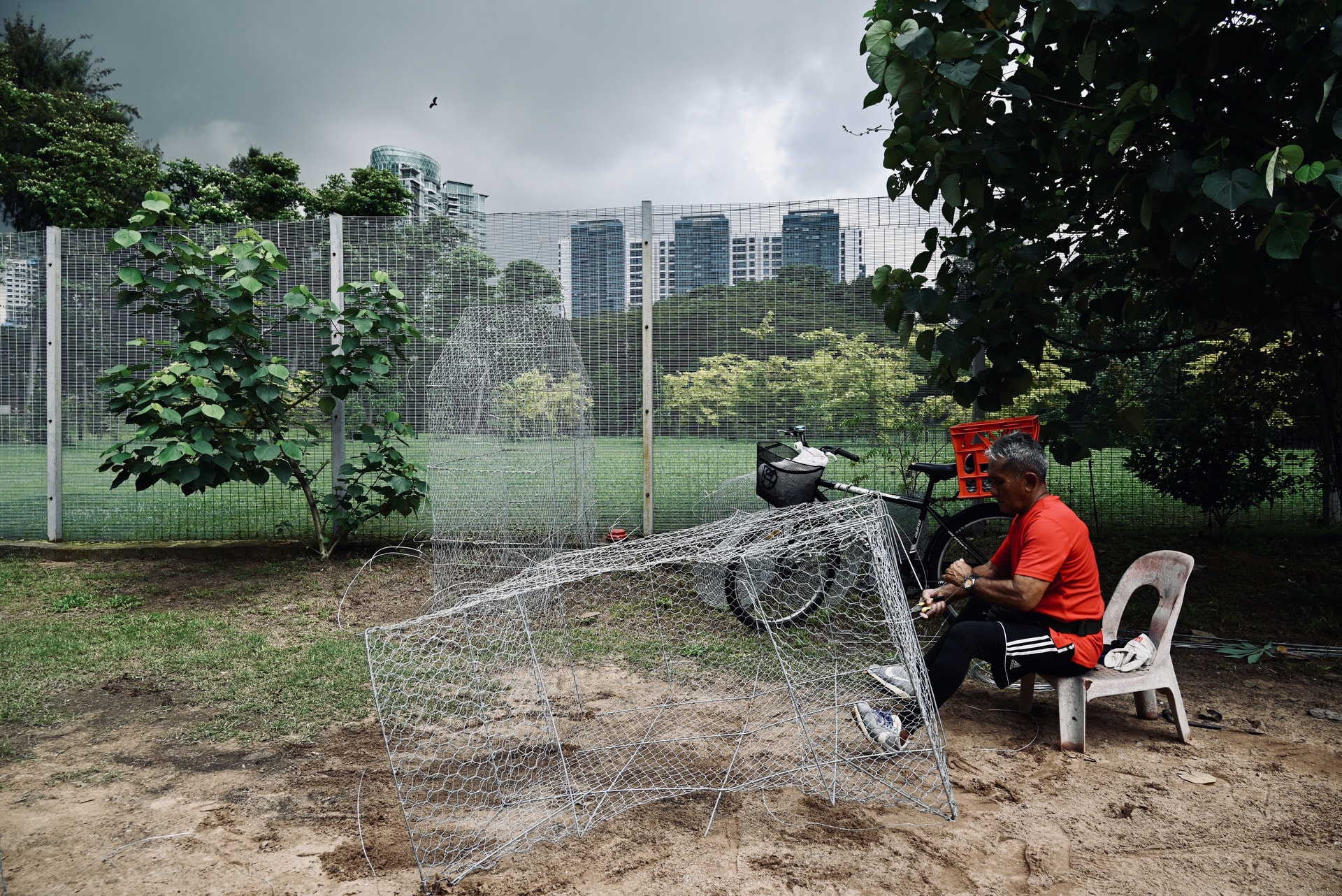 Image of man building a net