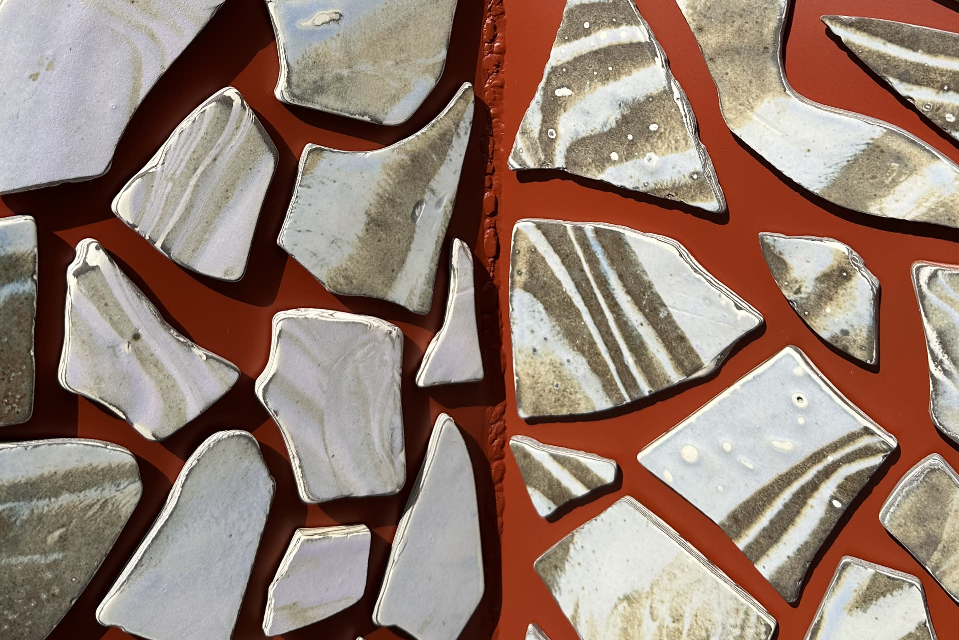 close up of venus ceramic pieces, striped like pieces of ceramic