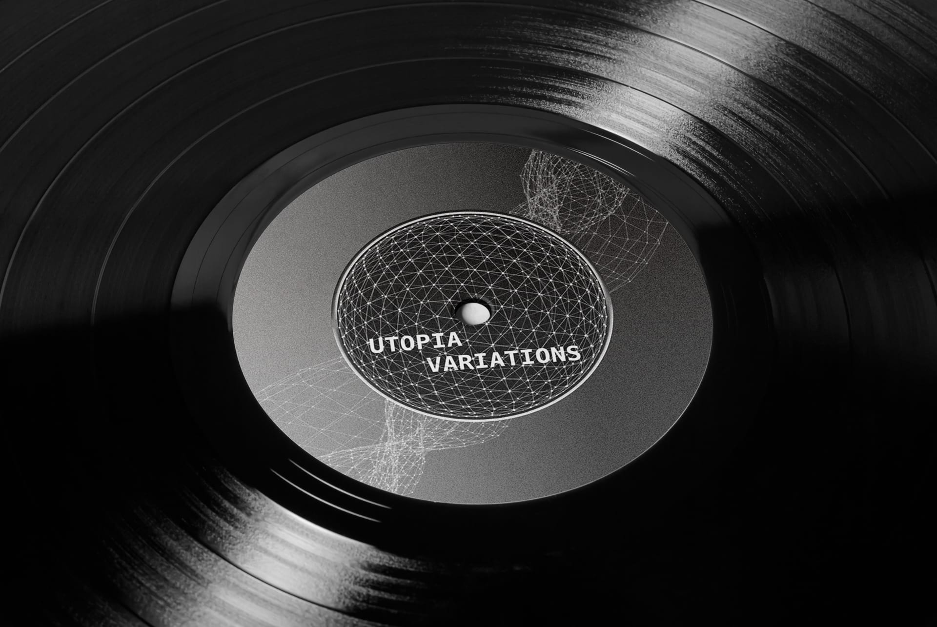 A vinyl record sticker in gray intricate pattern.