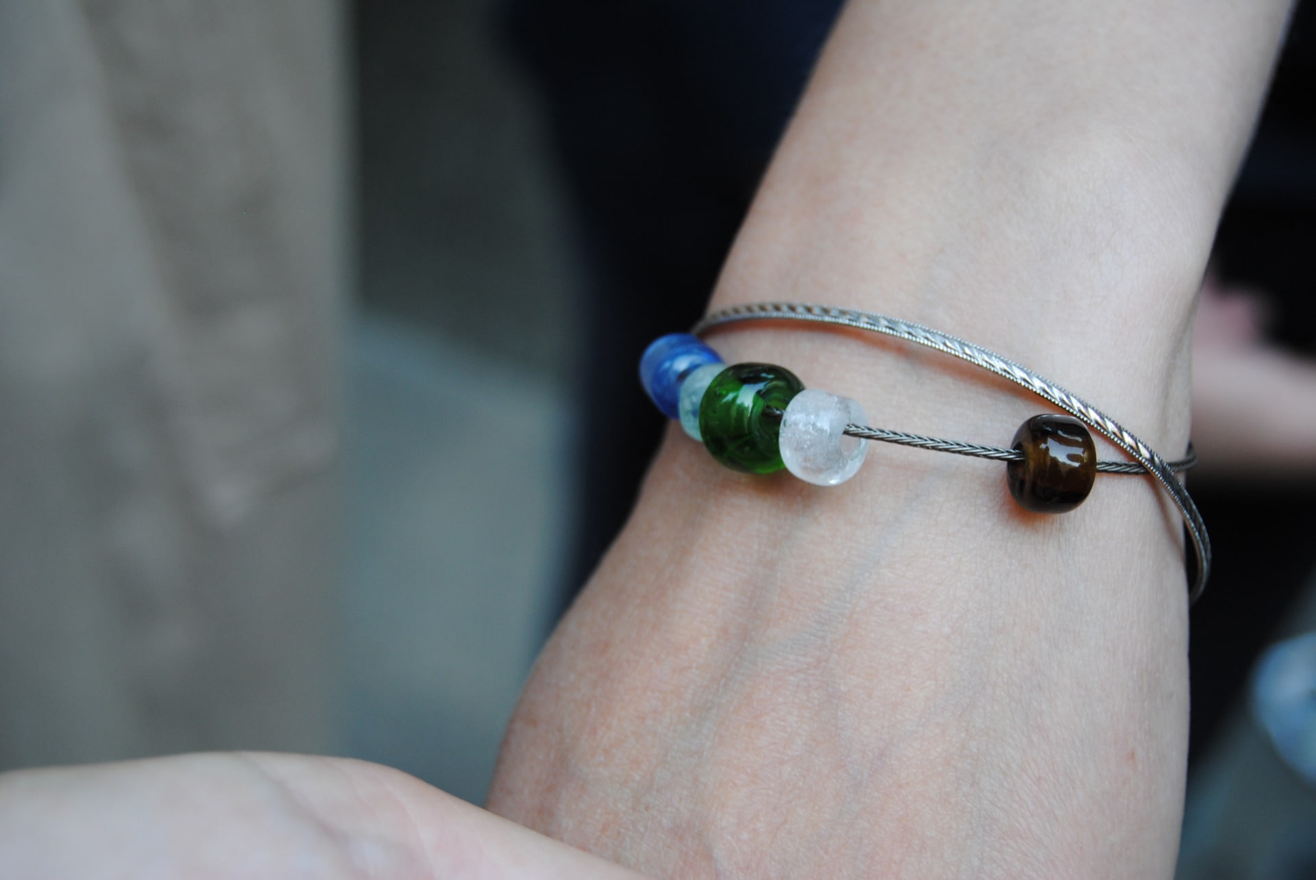 close up of a bracelet made of multicoloured glass beads