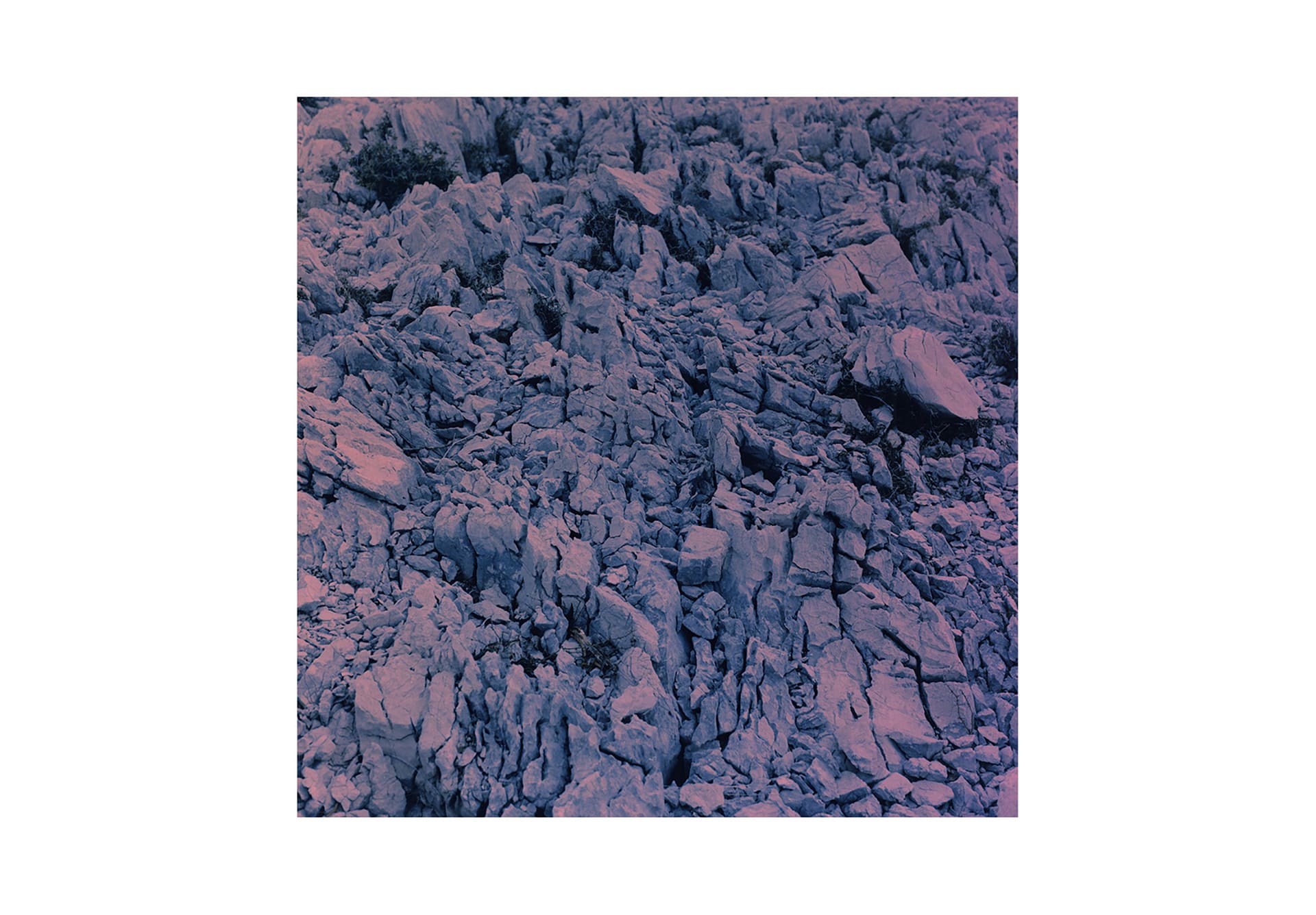 image of rocks - colours are blue and pink