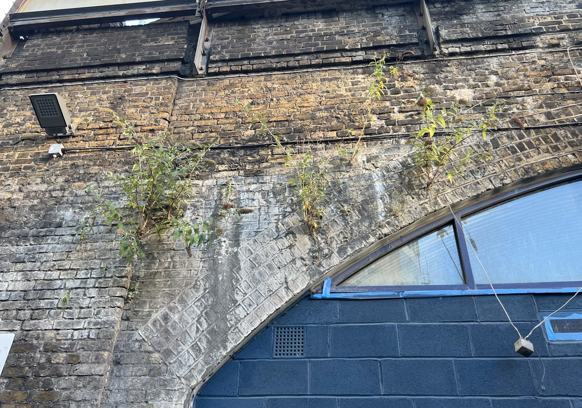 a brick building with a brick walkway