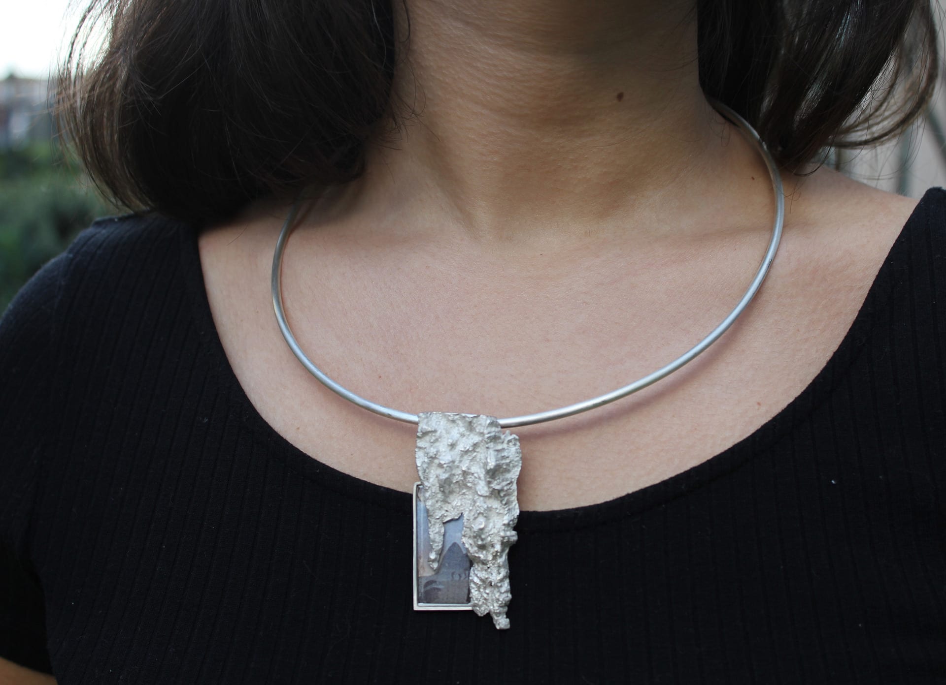 Secret Memory, Sterling silver, photograph and enamel pigments.