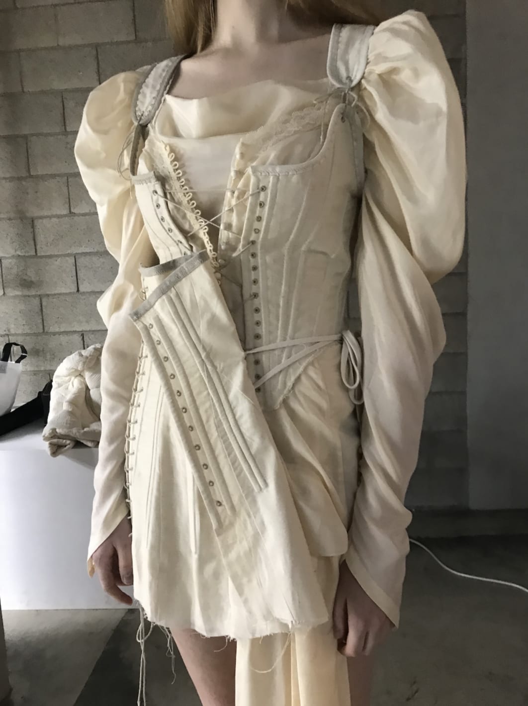 Close-up of dead stock silk dress and corset