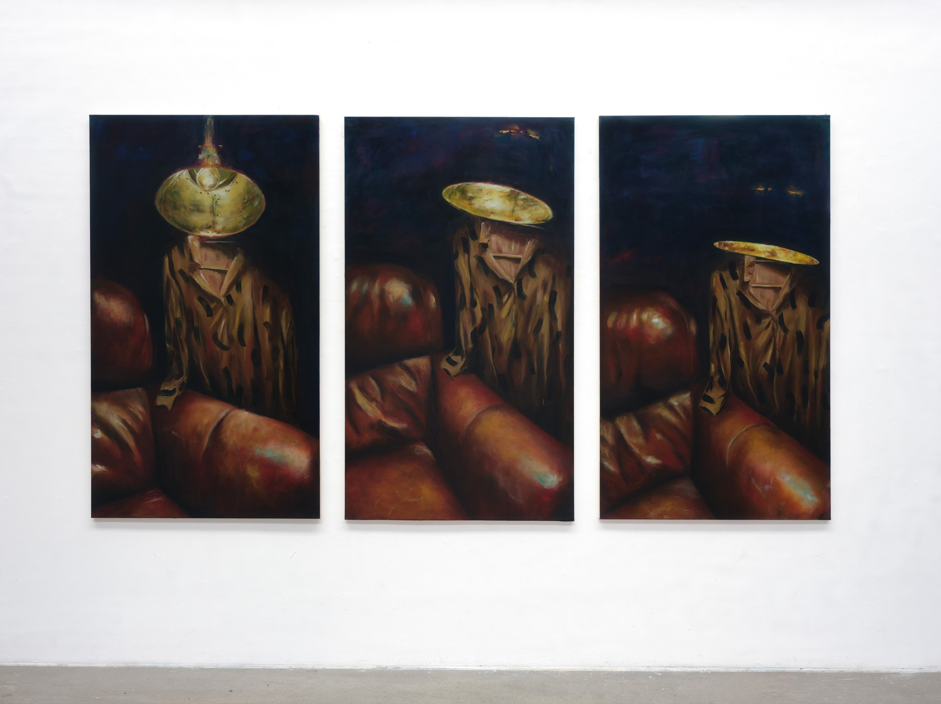 Three oil paintings show the edge of a leather sofa and, next to it, a lamp-like figure in a shirt in three different postures.