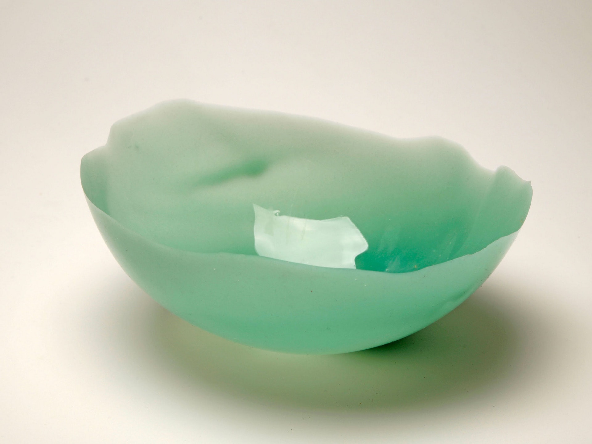 Cup of Information, silicone and viridian green pigment, 8.5 x 21.5 x 8.5 cm, 2022.