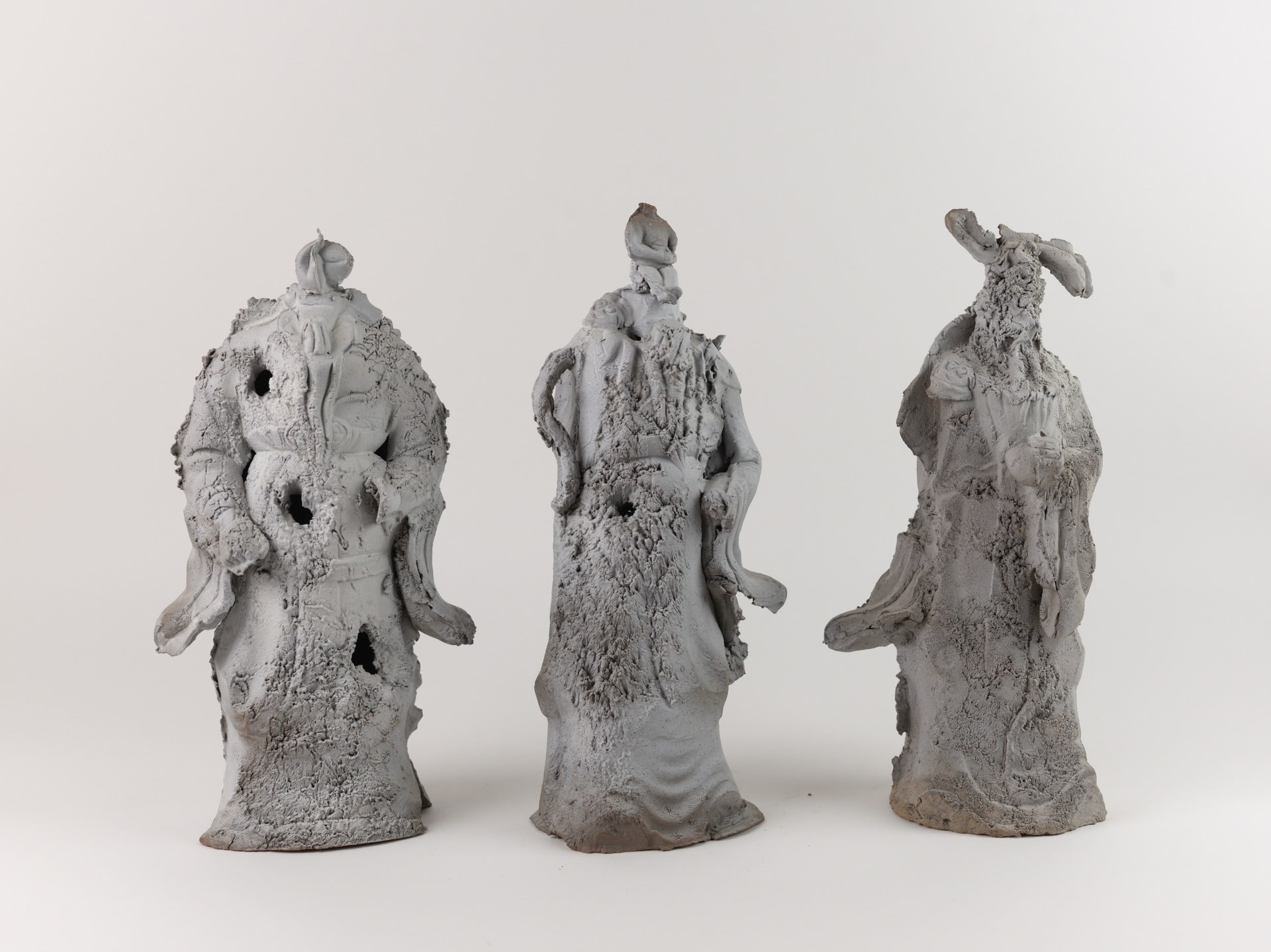 Three eroded gods standing for dispaly