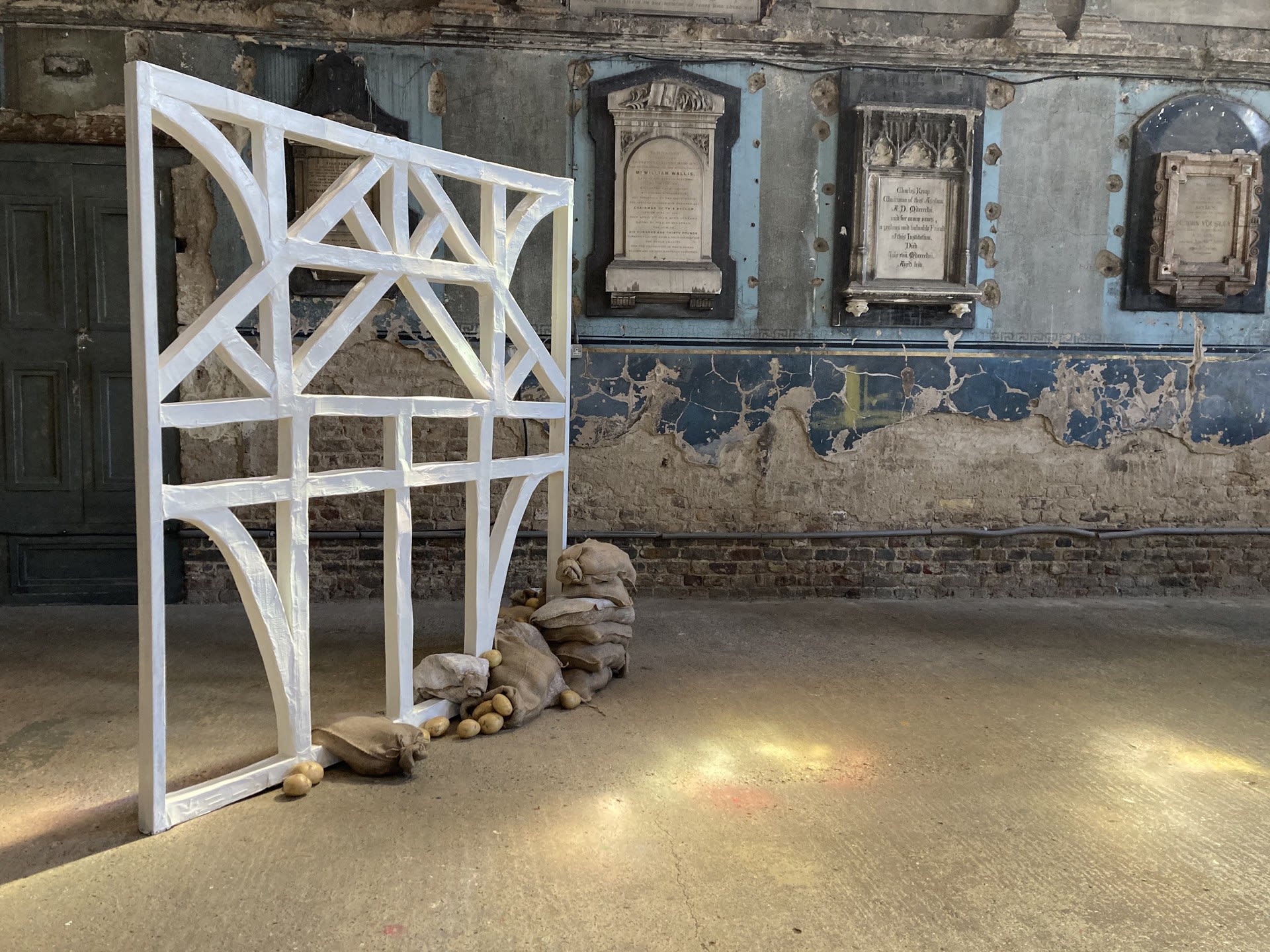 Grange, 2021, (dimensions variable) Cardboard, papier mache, household paint, hessian, potatoes