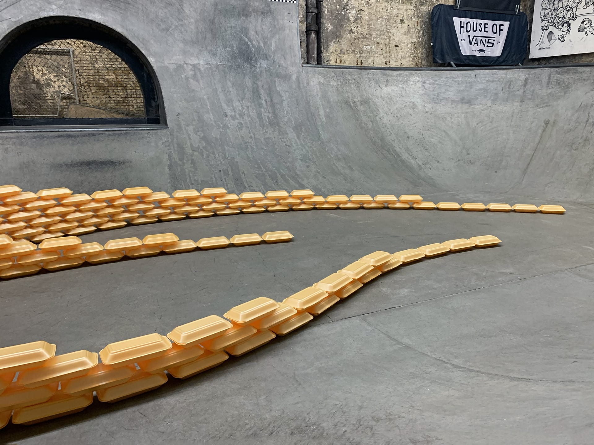 takeaway containers inside a skateboarding bowl