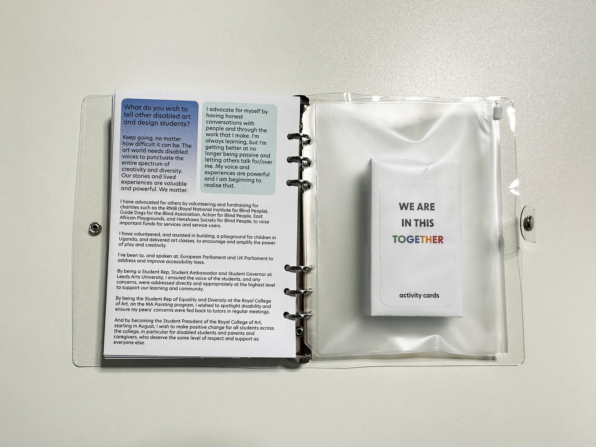 the deck of cards can be stored in a plastic pouch within the workbook ring binder