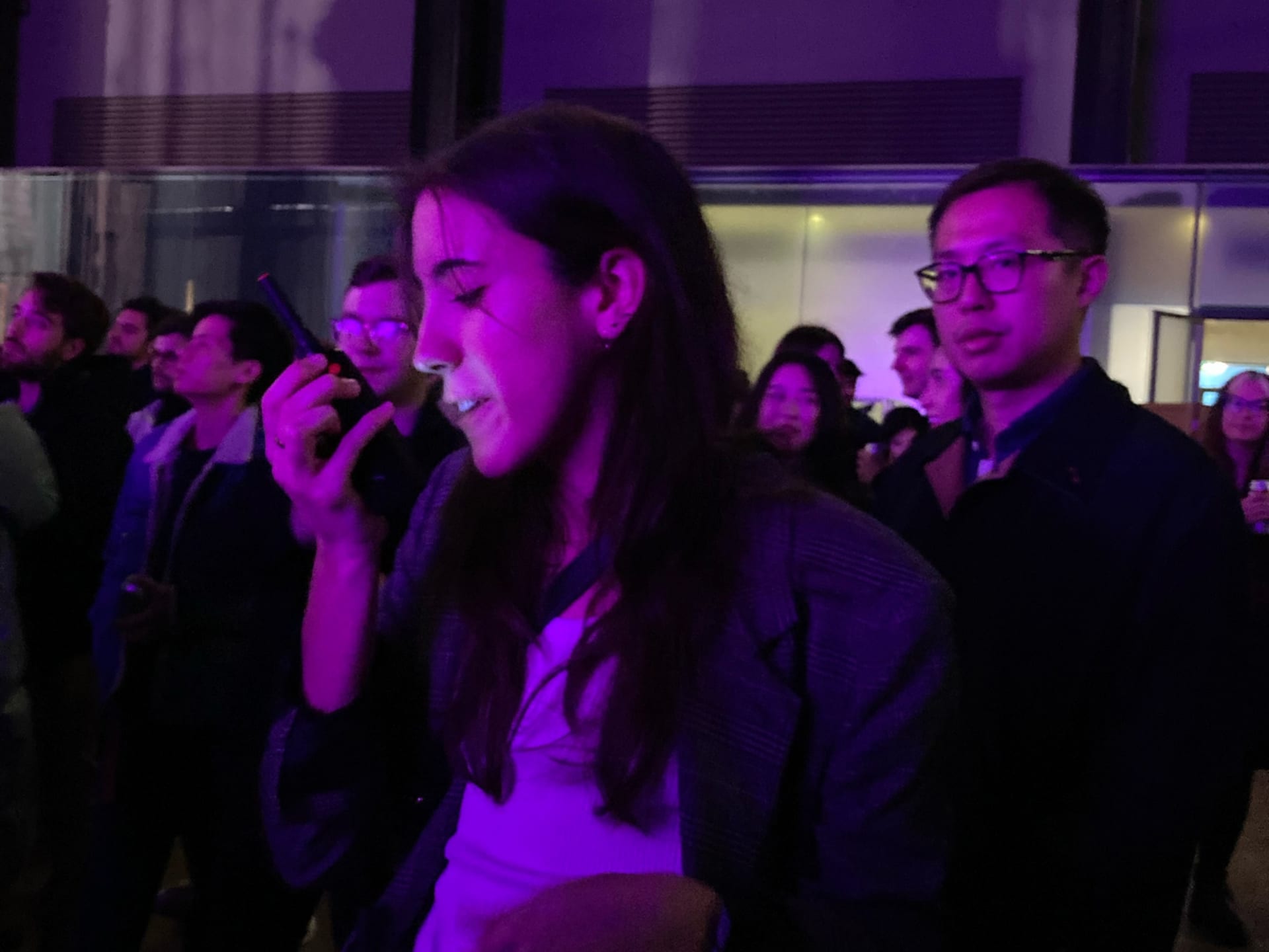 person using a walkie talkie at Tate Modern