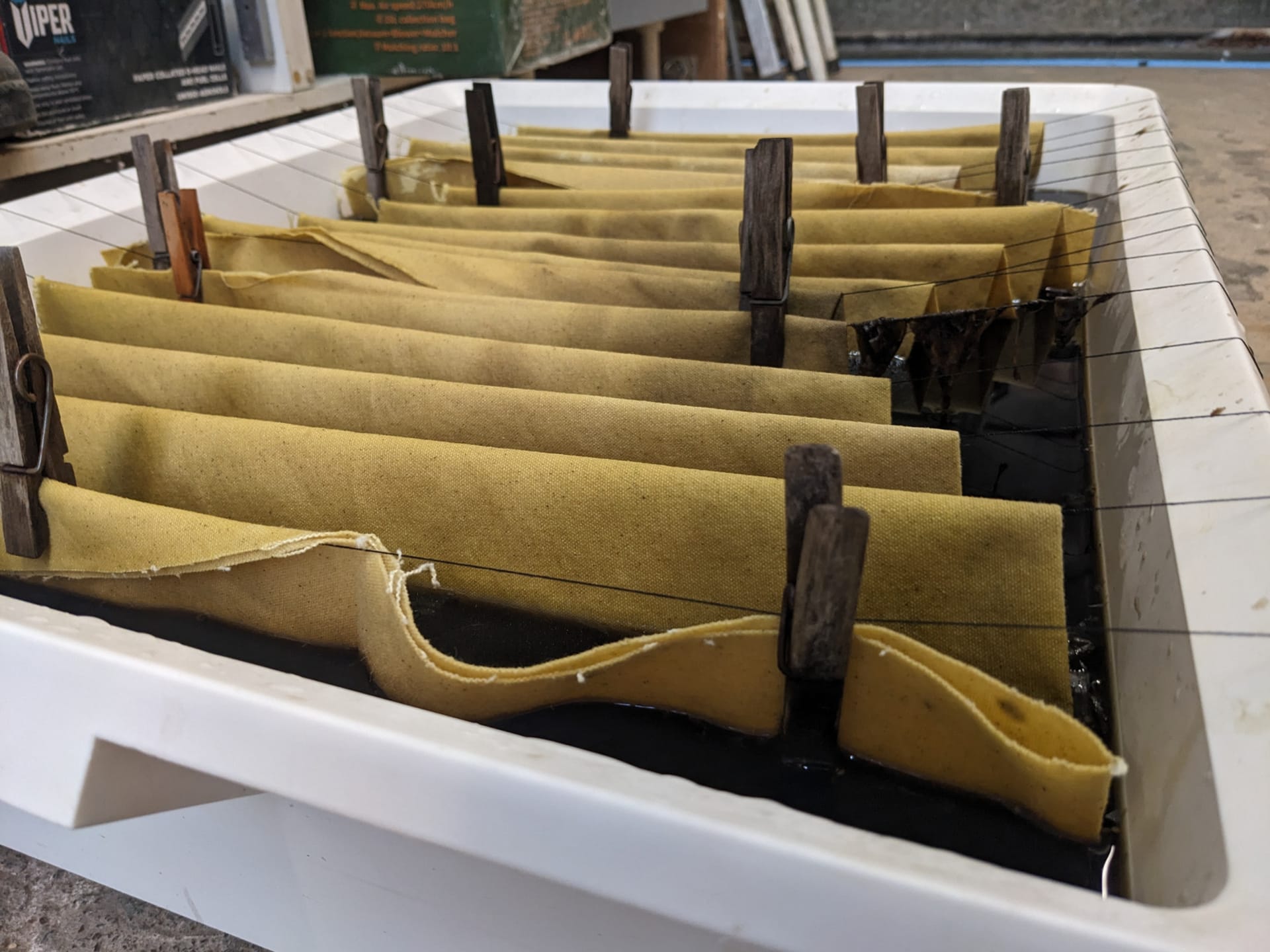 Upholstery fabric being dyed