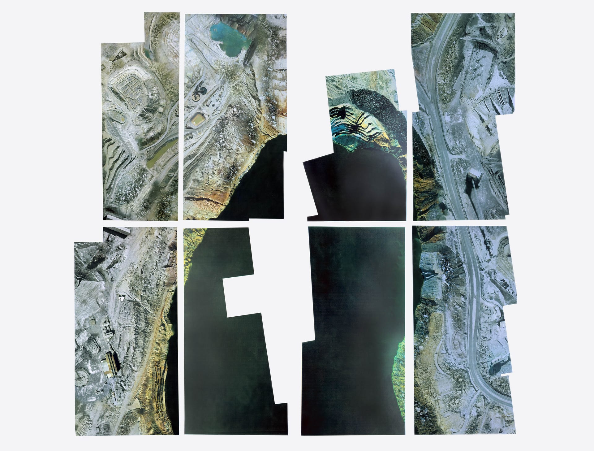 Eight screen prints on paper mounted on a wall, depicting an image of an open pit mine.