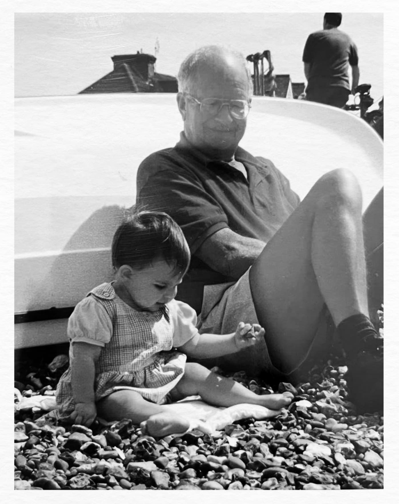 Photo of Lucy and Grandfather on the beach at Whitstable, 1998 