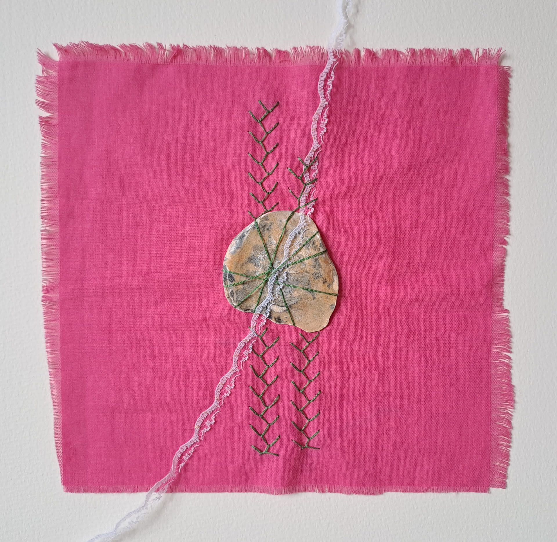 Image of paper with embroidery