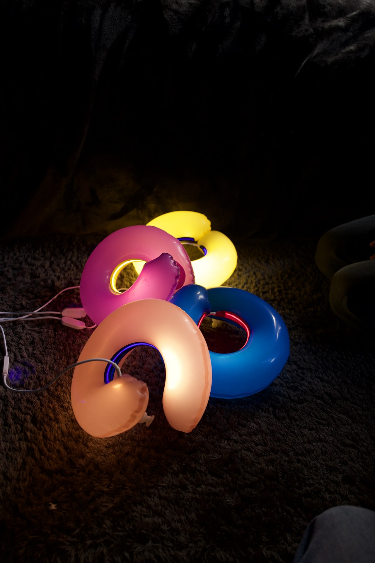 Ring colorful latex lamps laying on the floor