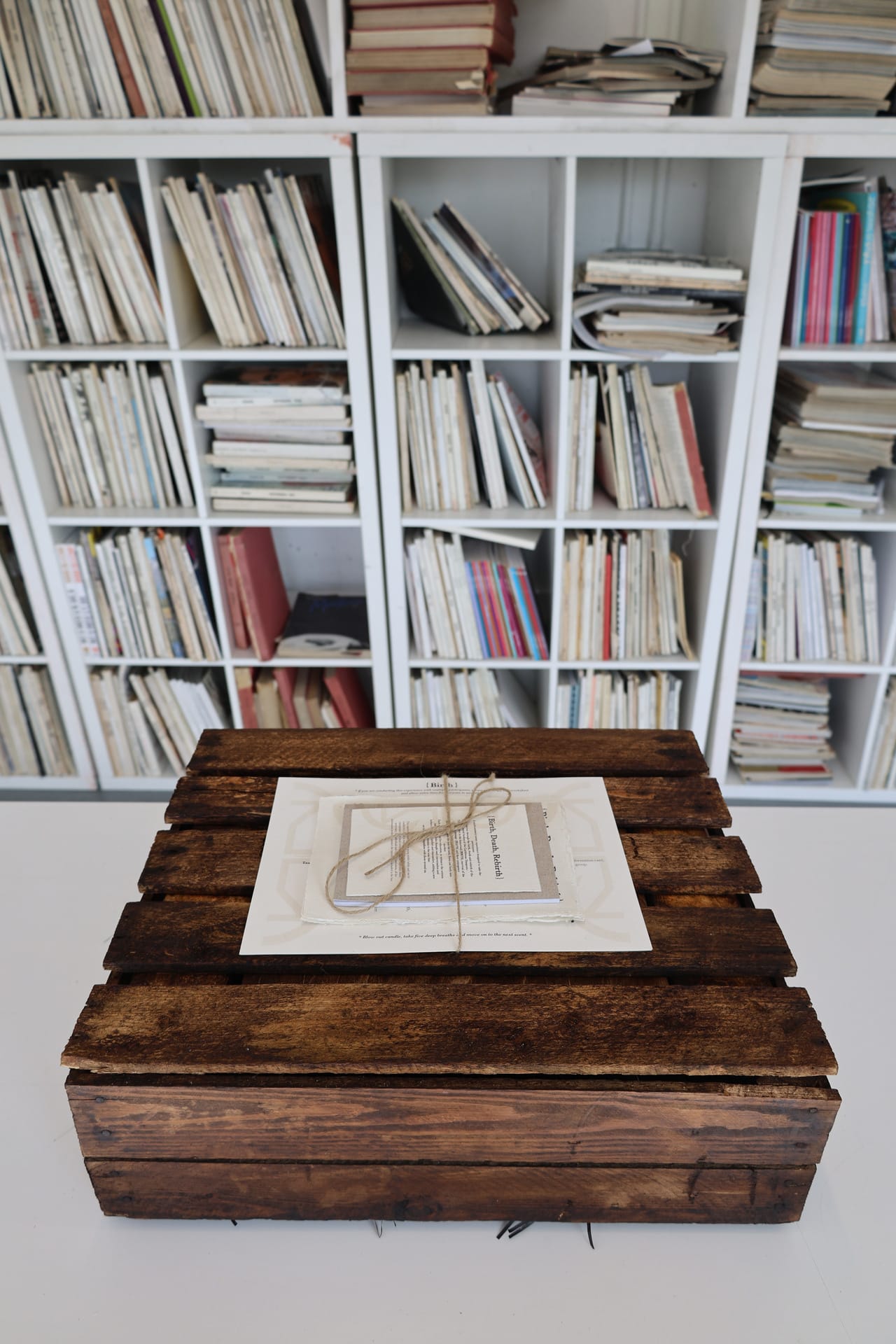 a wooden box with educational materials on top.