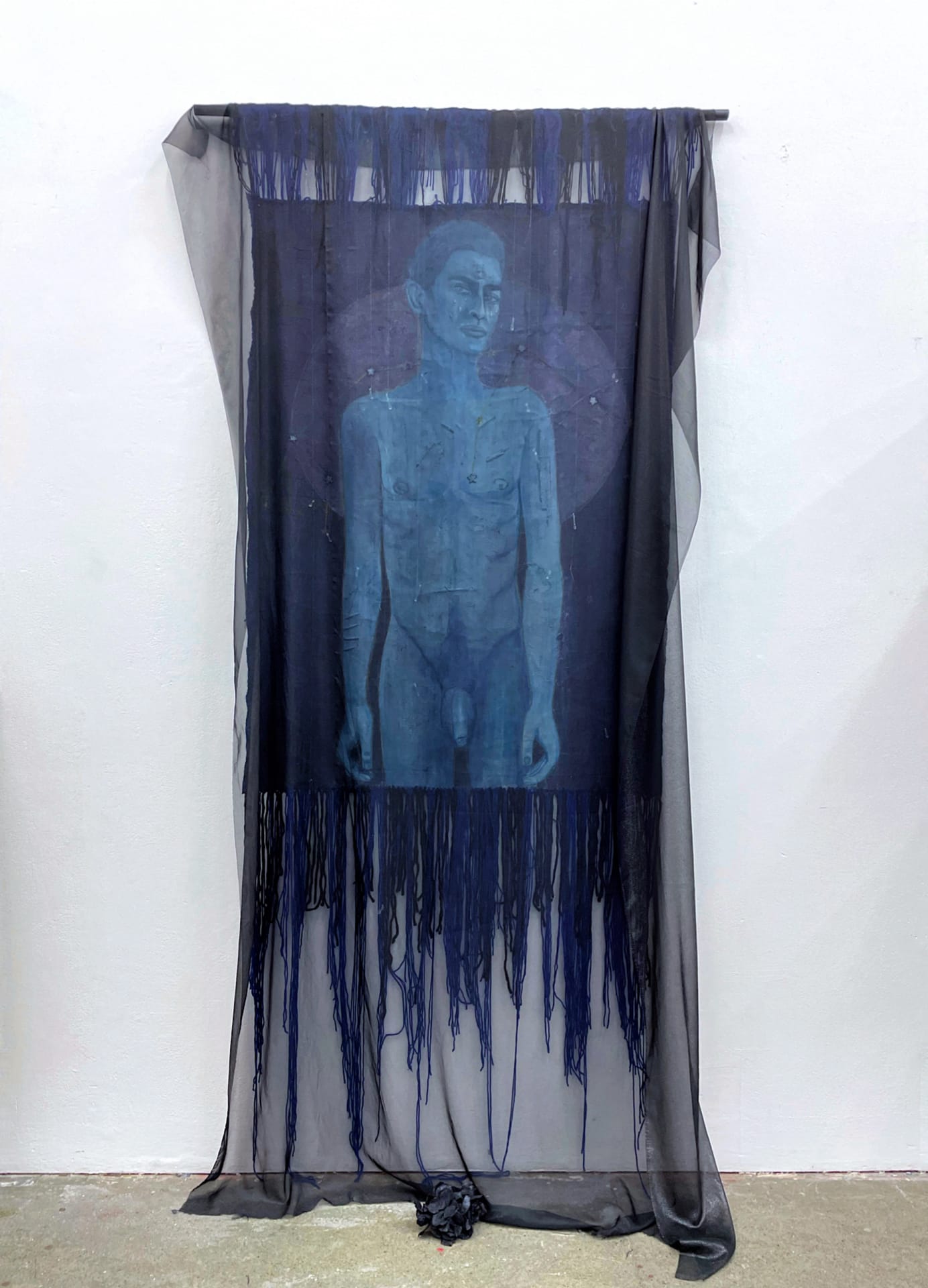 Memorial installation. Nude male figure covered with transparent veil