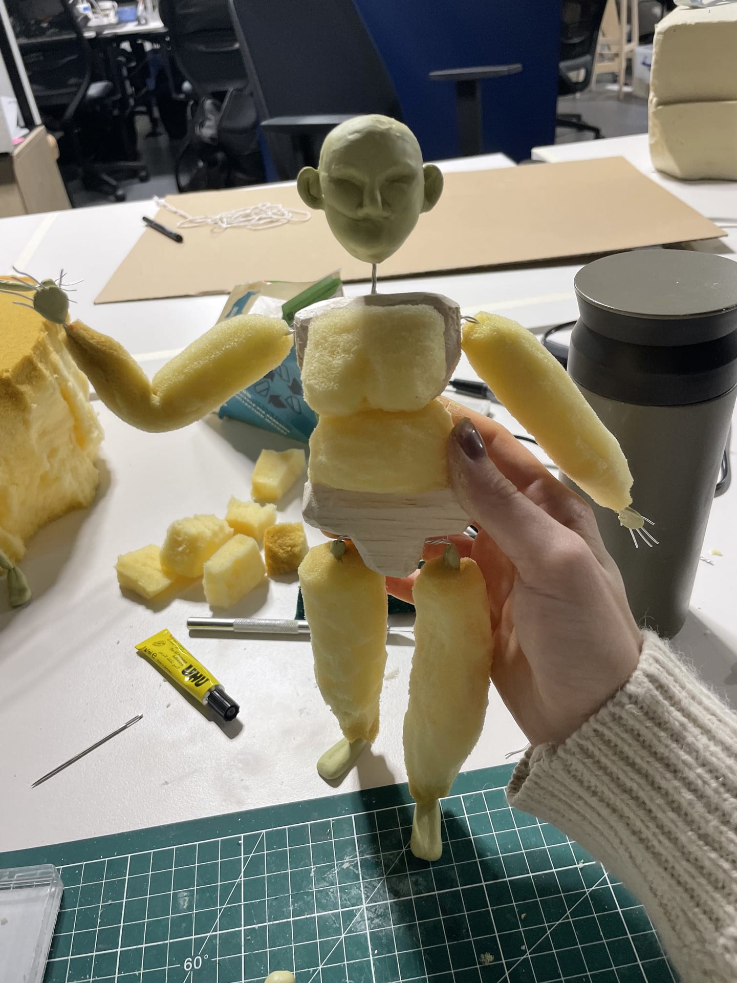 Half-finished puppet, showing armature made of wood, foam, aluminium wire and milliput.