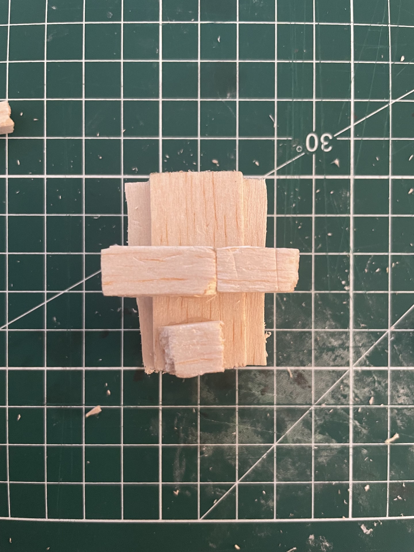 Beginning of a puppet head, simplified head shape made of Balsa wood