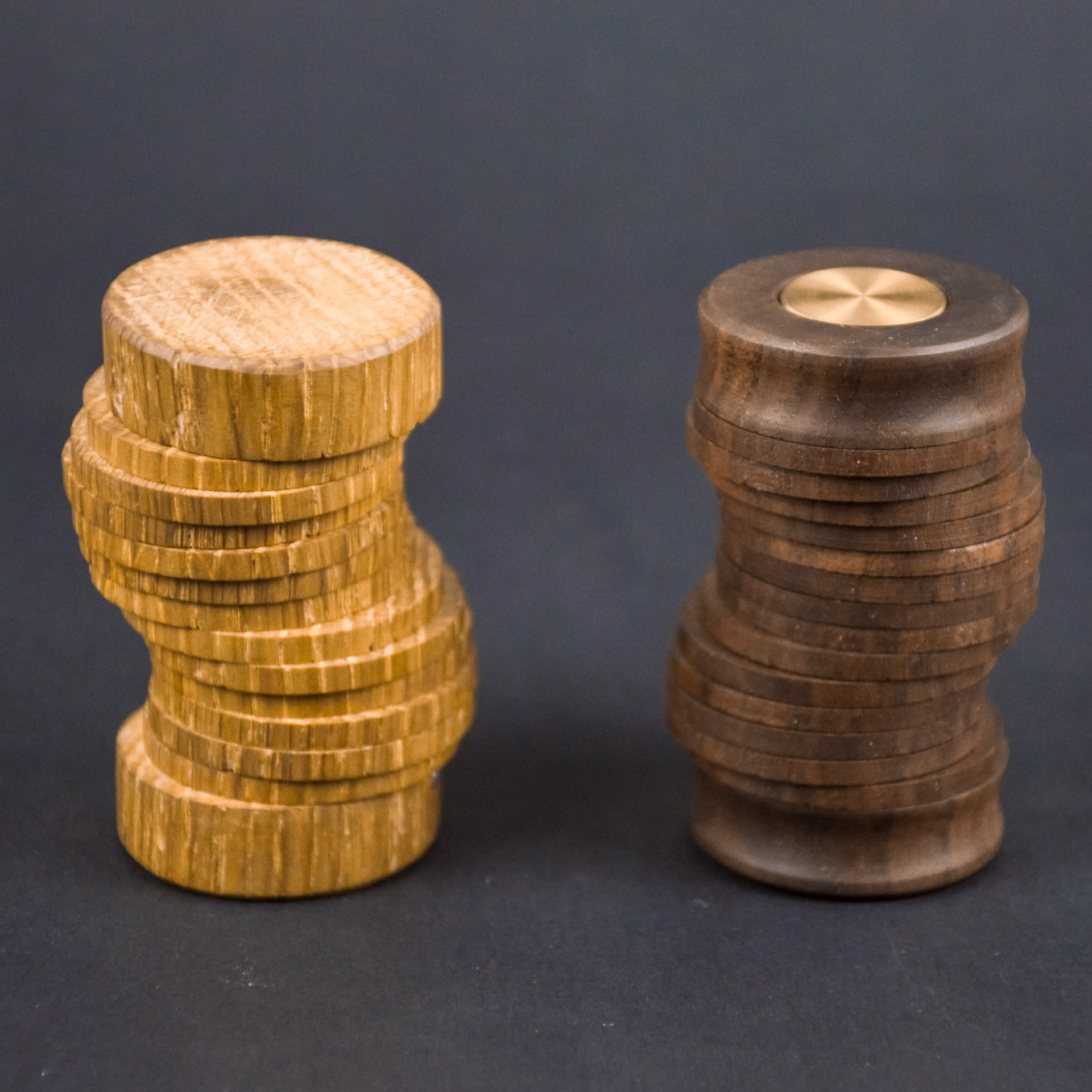 Wooden and brass objects, stacks of discs.