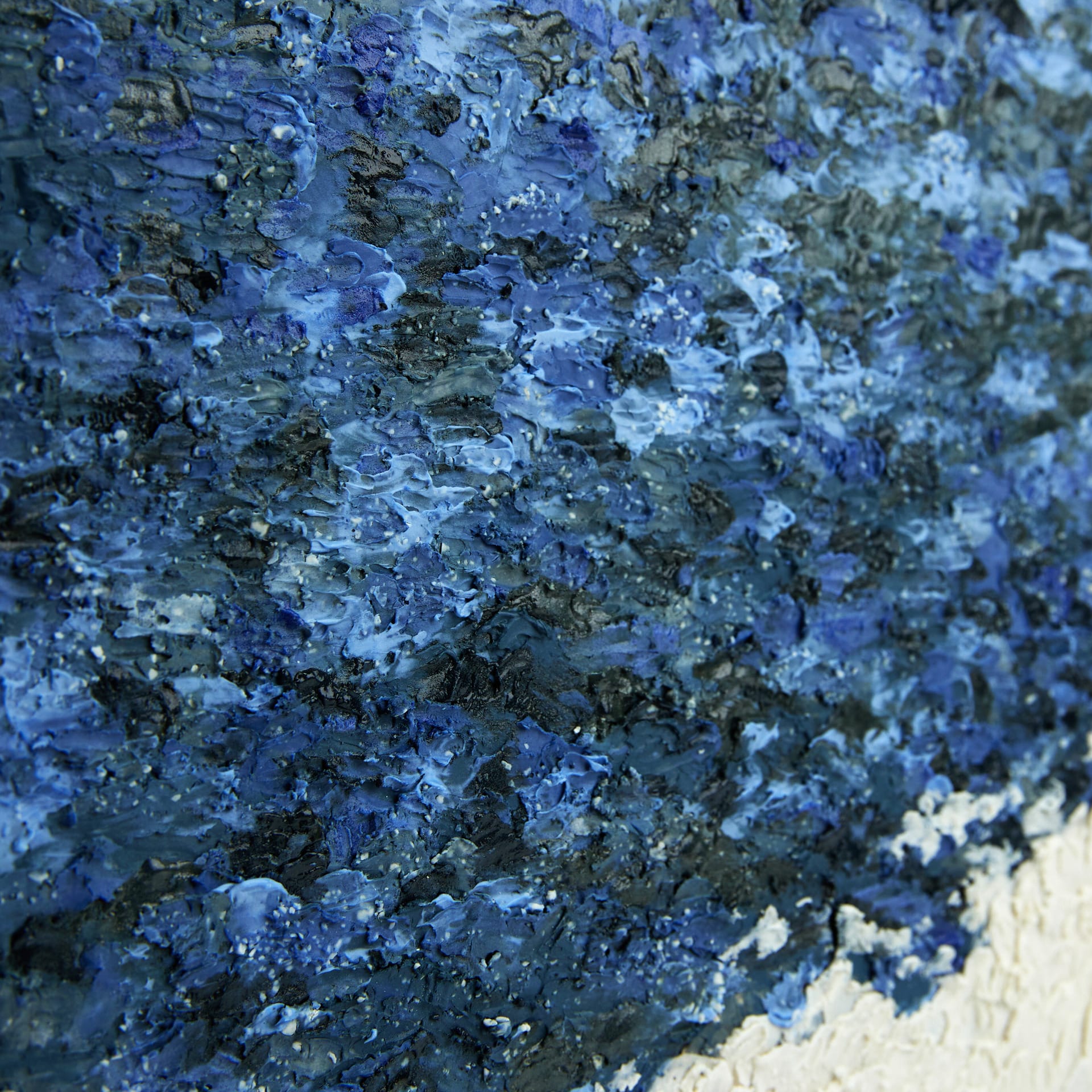 Surface covered with blue and white texture.