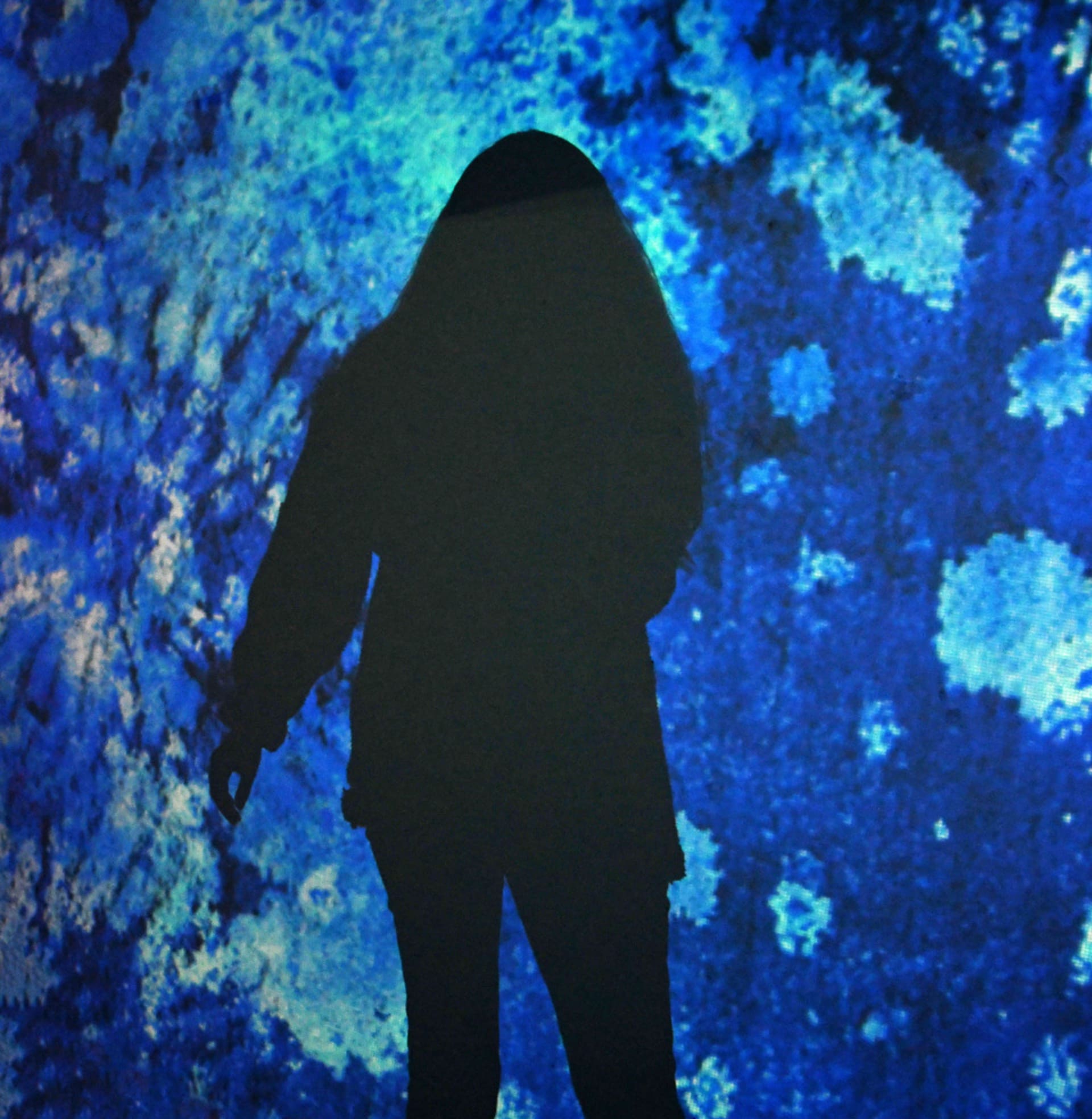 Blue cyanotype with shadow figure.